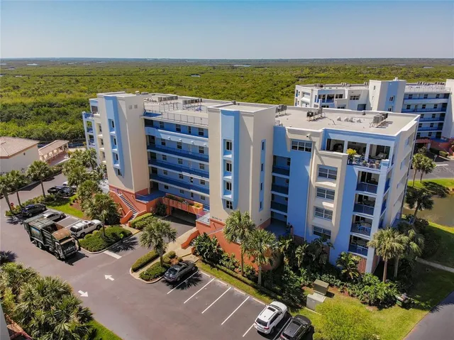 a view of a city and ocean view
