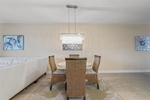 a view of a hallway with seating area