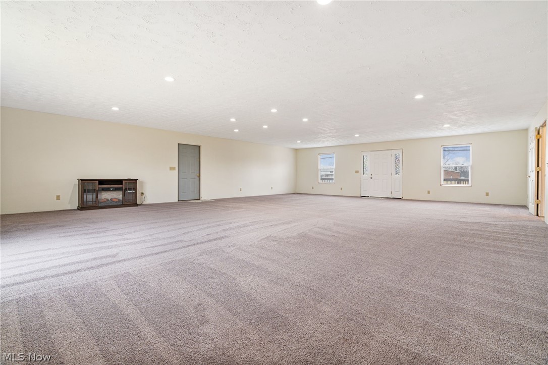 1640 Old Delaware Road Mount Vernon, OH 43050 - Photo 28 of 49 Unfurnished living room with carpet flooring and recessed lighting