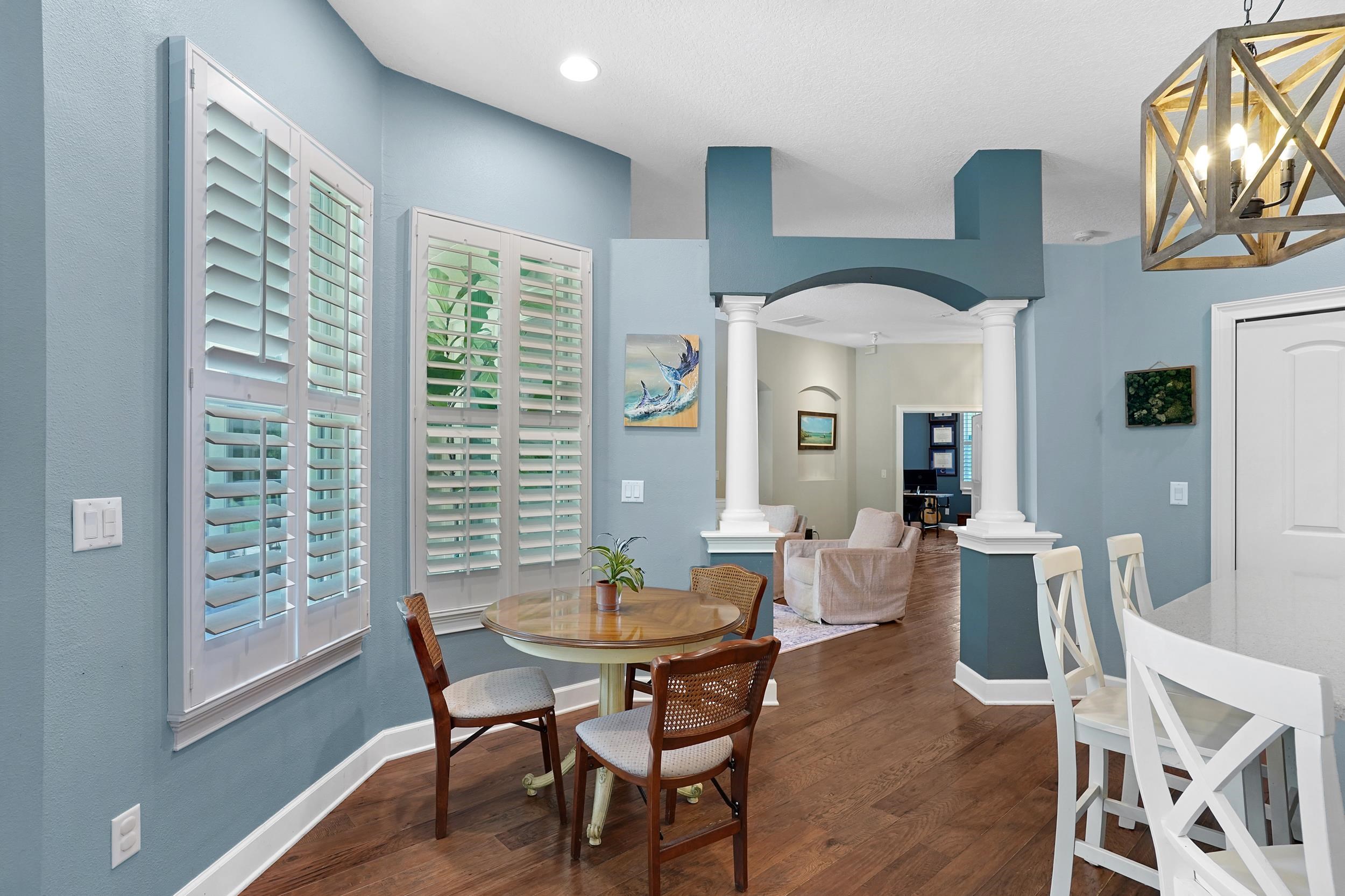 1308 Acorn Ridge Court St. Augustine, FL 32092 - Photo 13 of 47 a view of a dining room with furniture window and wooden floor