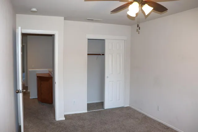 an empty room with a bathroom