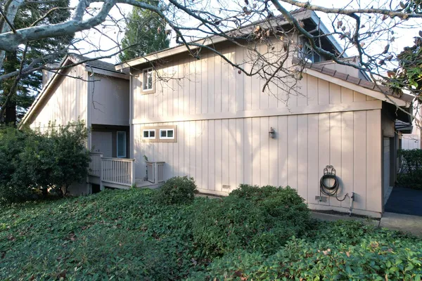 a backyard of a house with lots of green space