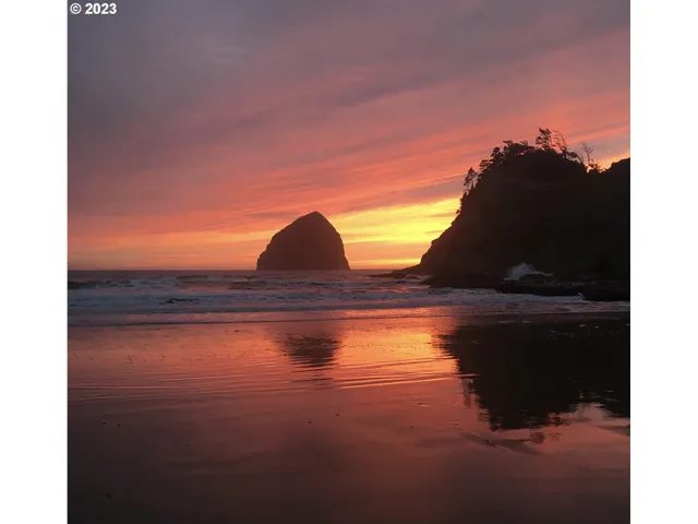 a picture of a bathroom with a sink and mirror