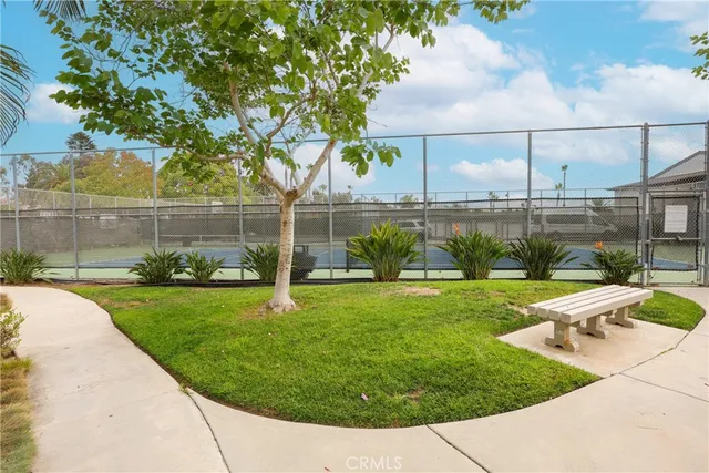 a view of a backyard with sitting area