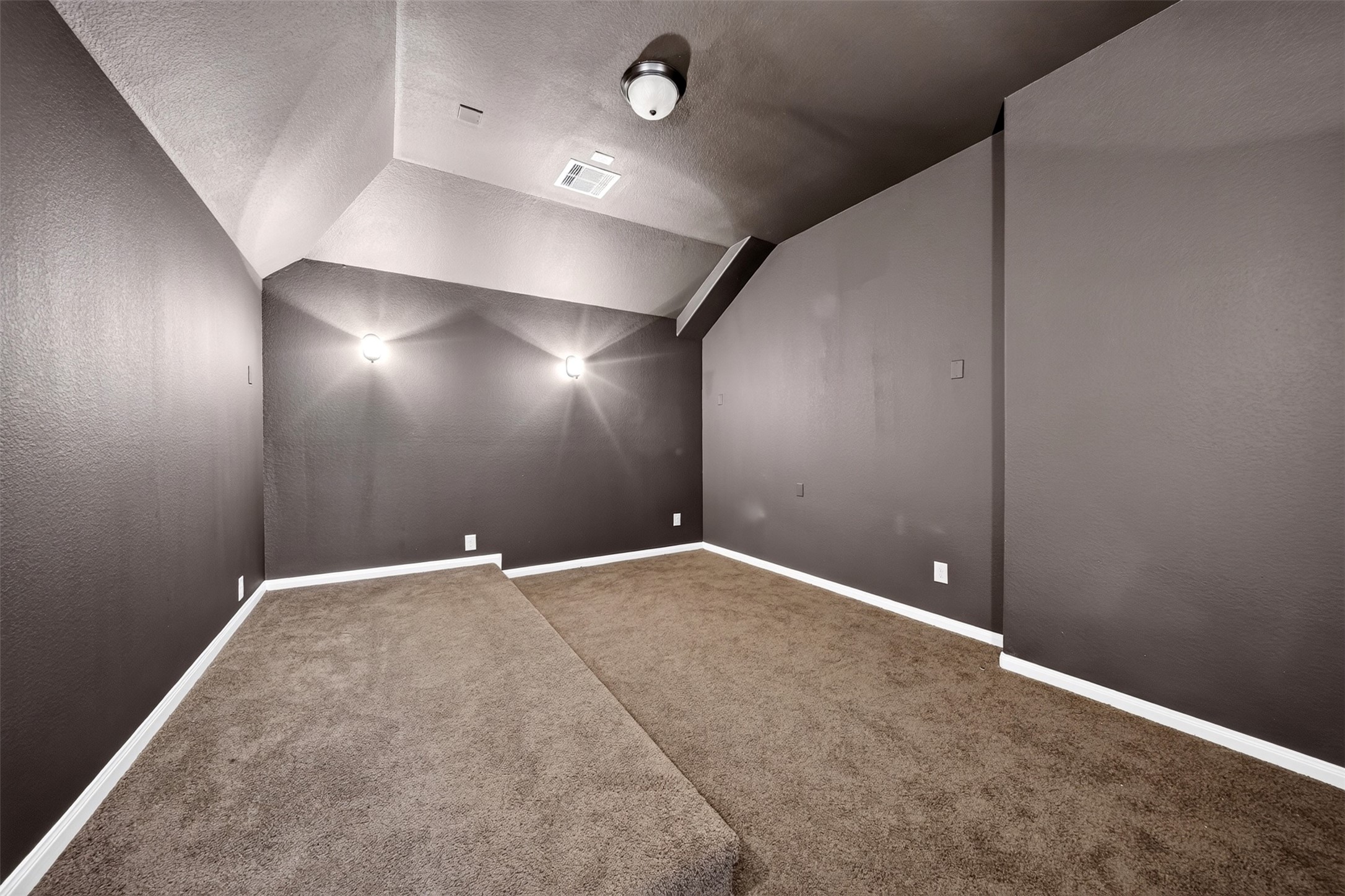 6234 Avon Landing Lane Spring, TX 77379 - Photo 27 of 49 The media room offers specialized lighting, tiered seating, wall-to-wall carpeting, angled ceiling lines work together to dampen echo and improve sound quality and is versatile enough to be used as a virtual golf / track simulator.