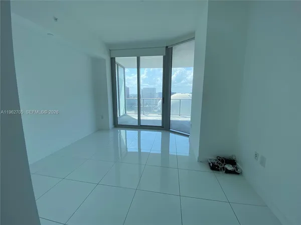a view of a balcony with furniture