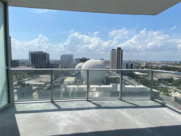 a view of empty room with floor to ceiling window
