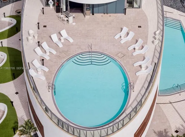 an aerial view of a swimming pool