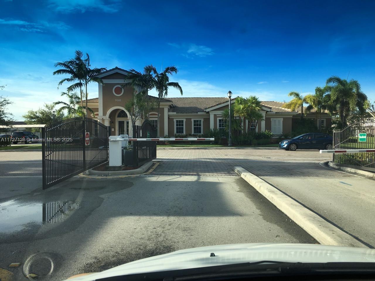 5923 Abbey Road Tamarac, FL 33321 - Photo 33 of 37 a front view of building with yard