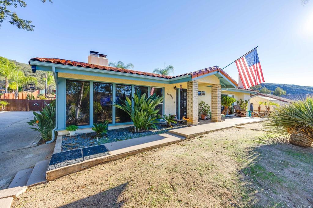 a front view of a house with a porch