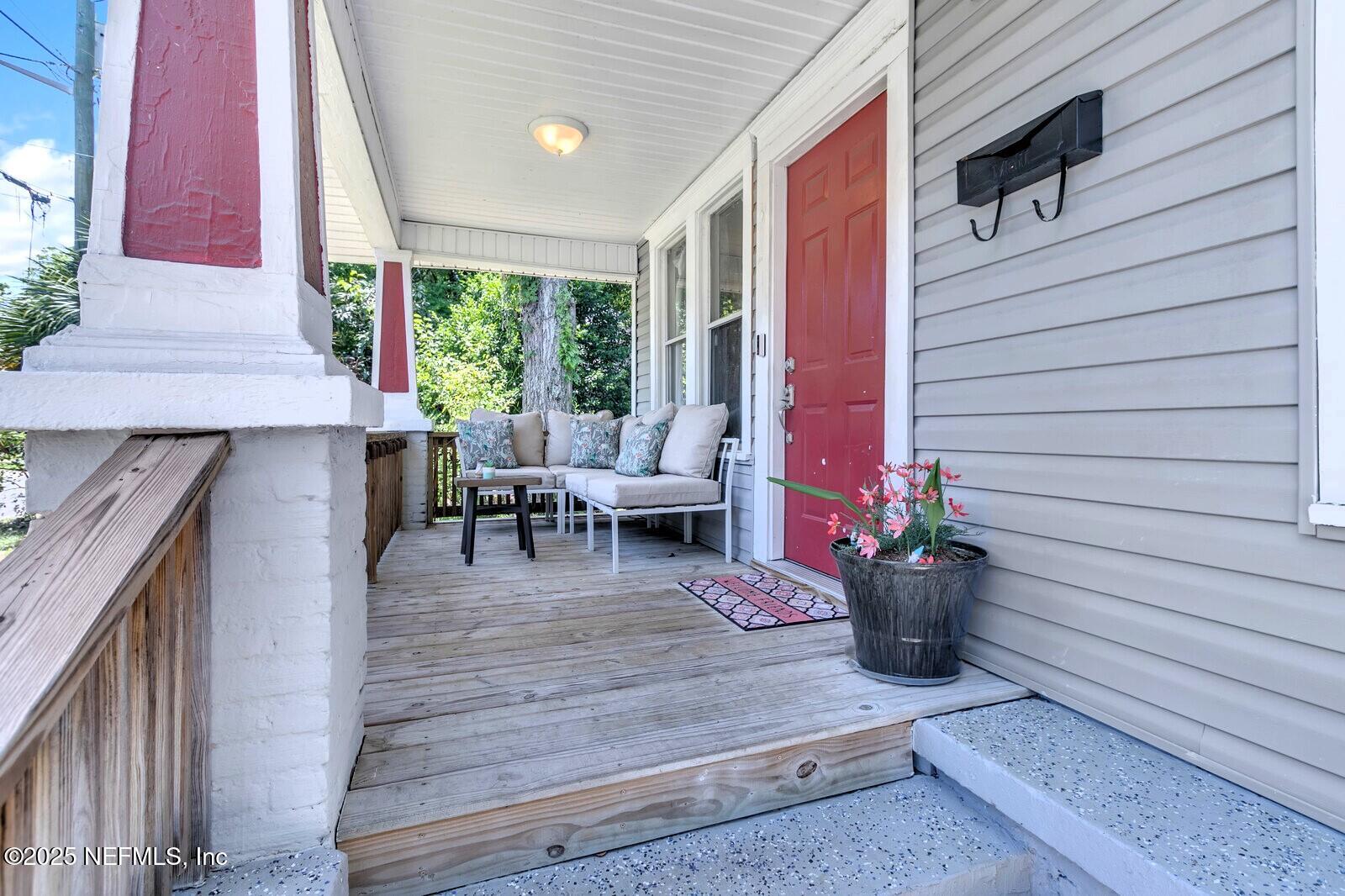 1336 Rushing Street Jacksonville, FL 32209 - Photo 15 of 19 a view of a patio with chairs and potted plants
