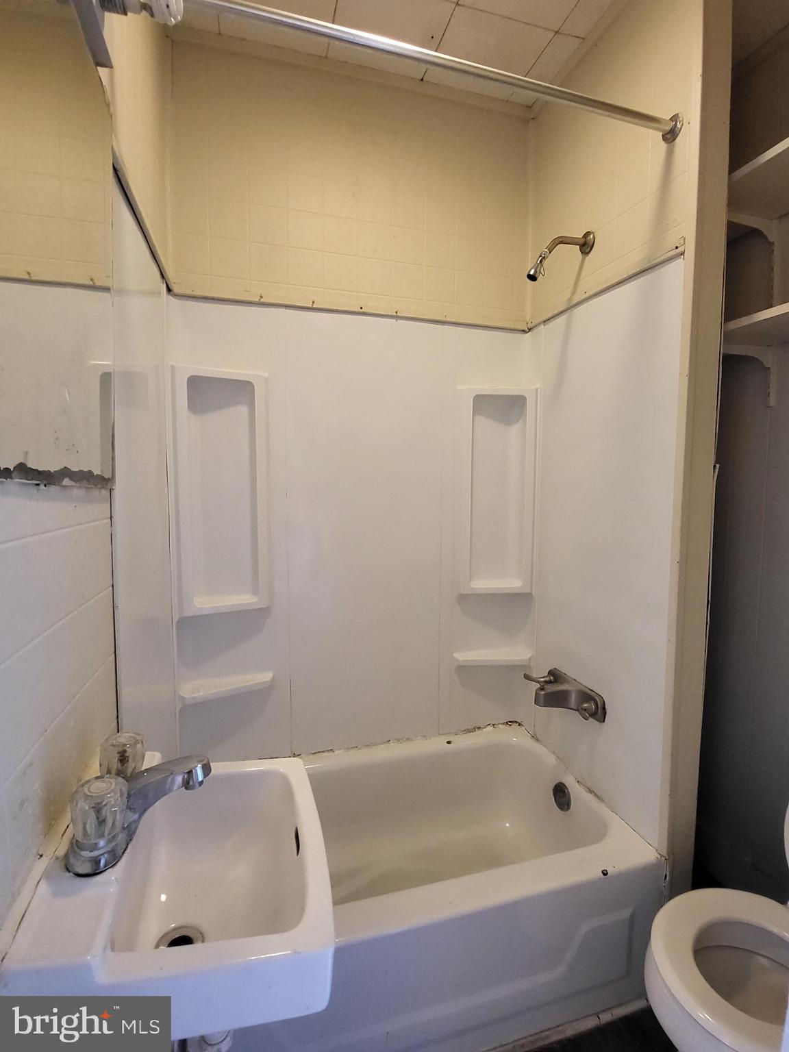 830 Church Street Reading, PA 19601 - Photo 8 of 12 a bathroom with a tub and shower