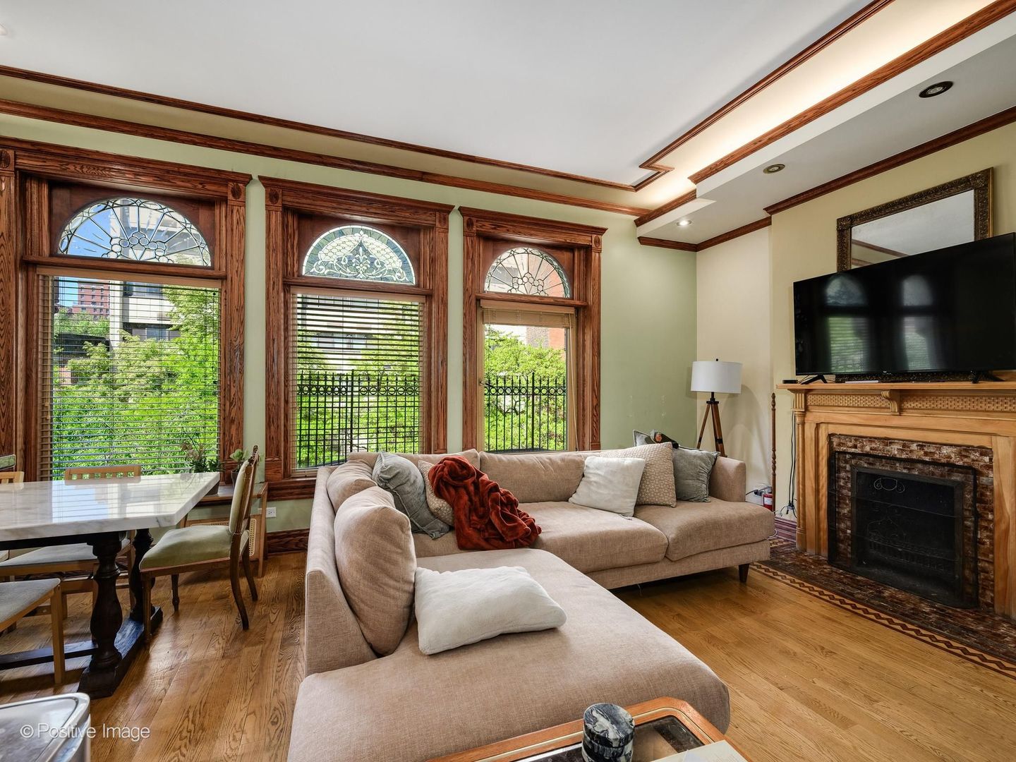 33 East Division Street Chicago, IL 60611 - Photo 16 of 34 a living room with furniture a fireplace and a flat screen tv