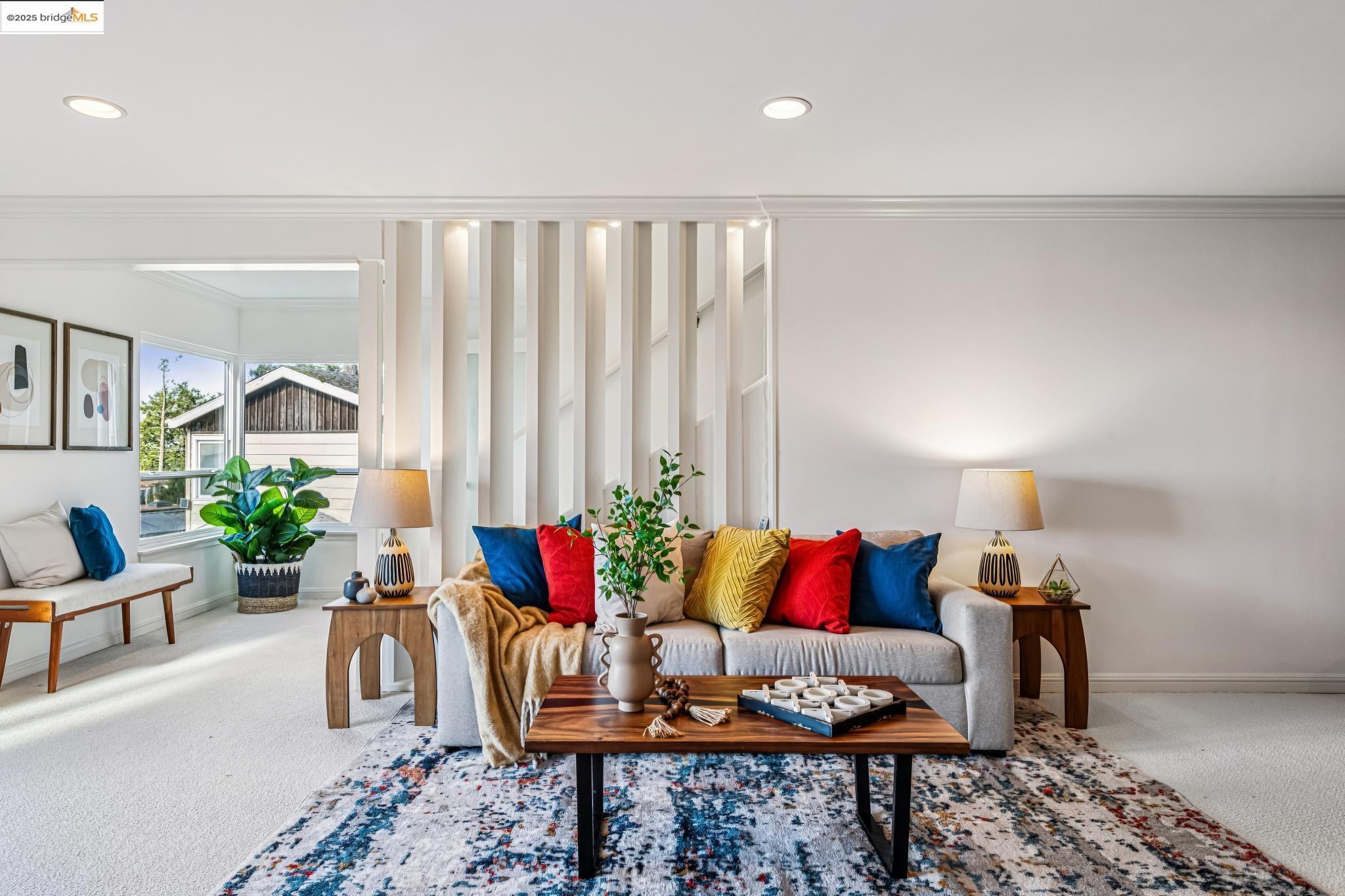 946 Creston Road Berkeley, CA 94708 - Photo 18 of 44 a living room with furniture and flowers