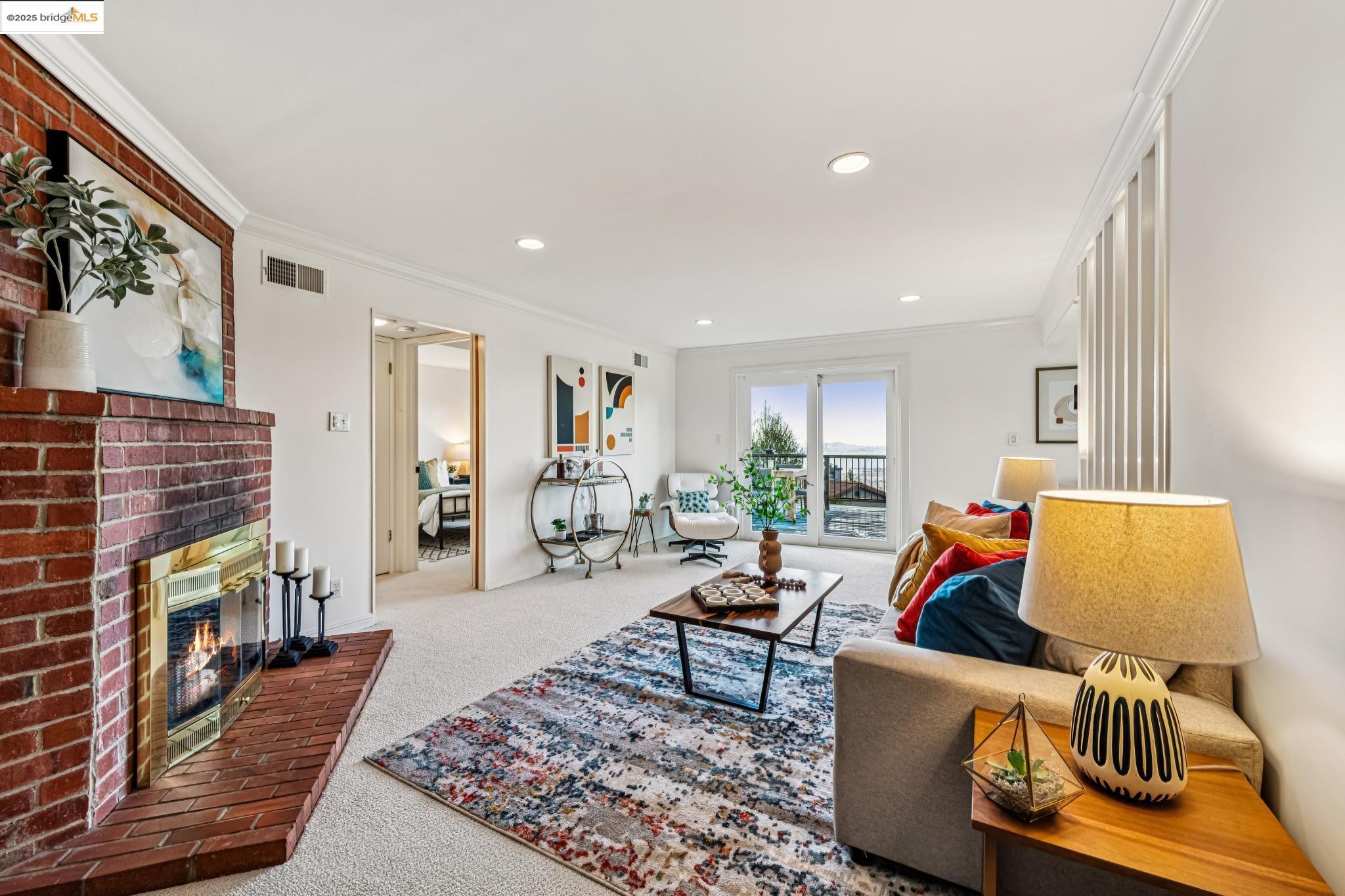 946 Creston Road Berkeley, CA 94708 - Photo 19 of 44 a living room with furniture and a flat screen tv