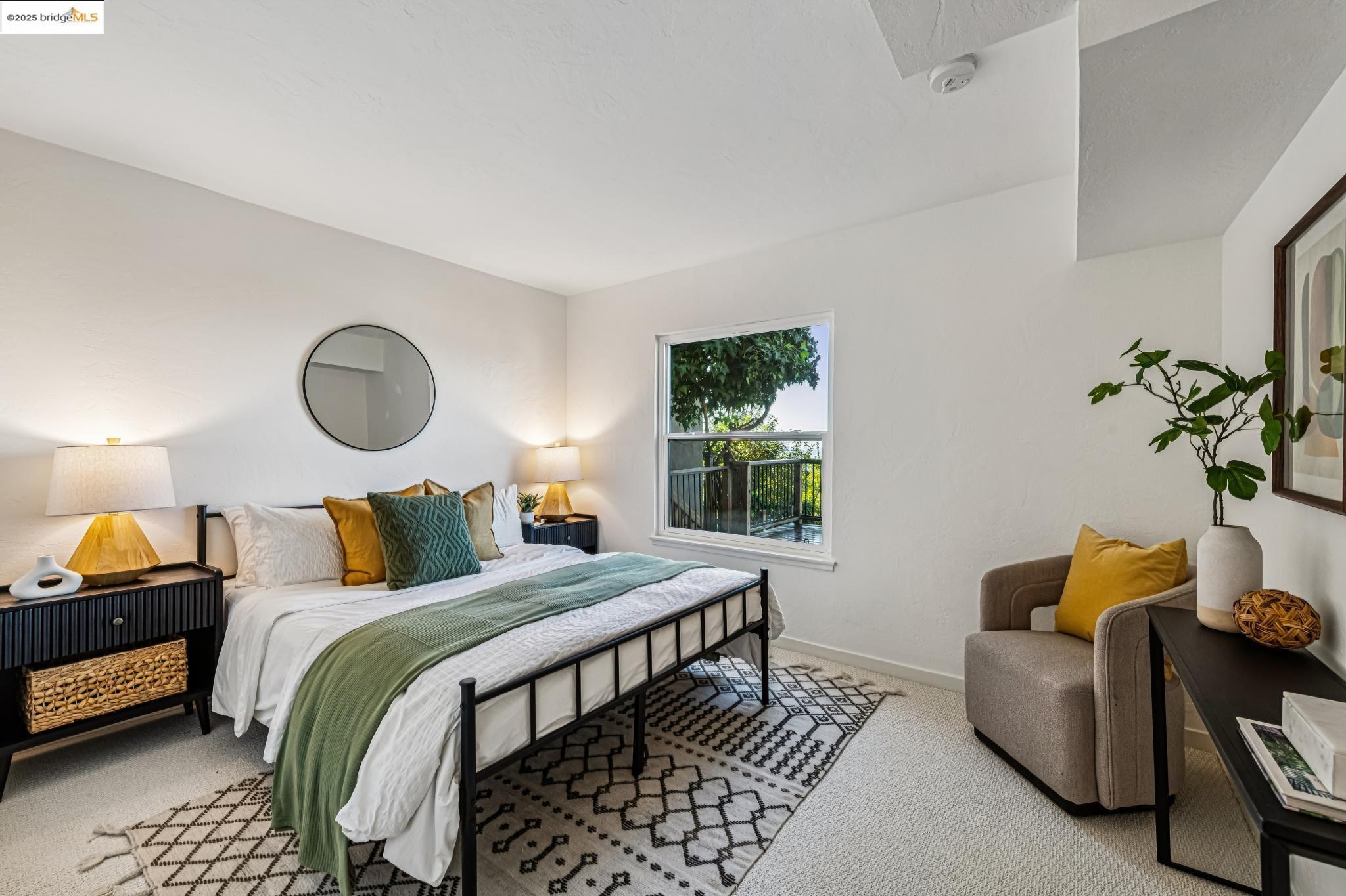 946 Creston Road Berkeley, CA 94708 - Photo 20 of 44 a bedroom with bed and a window