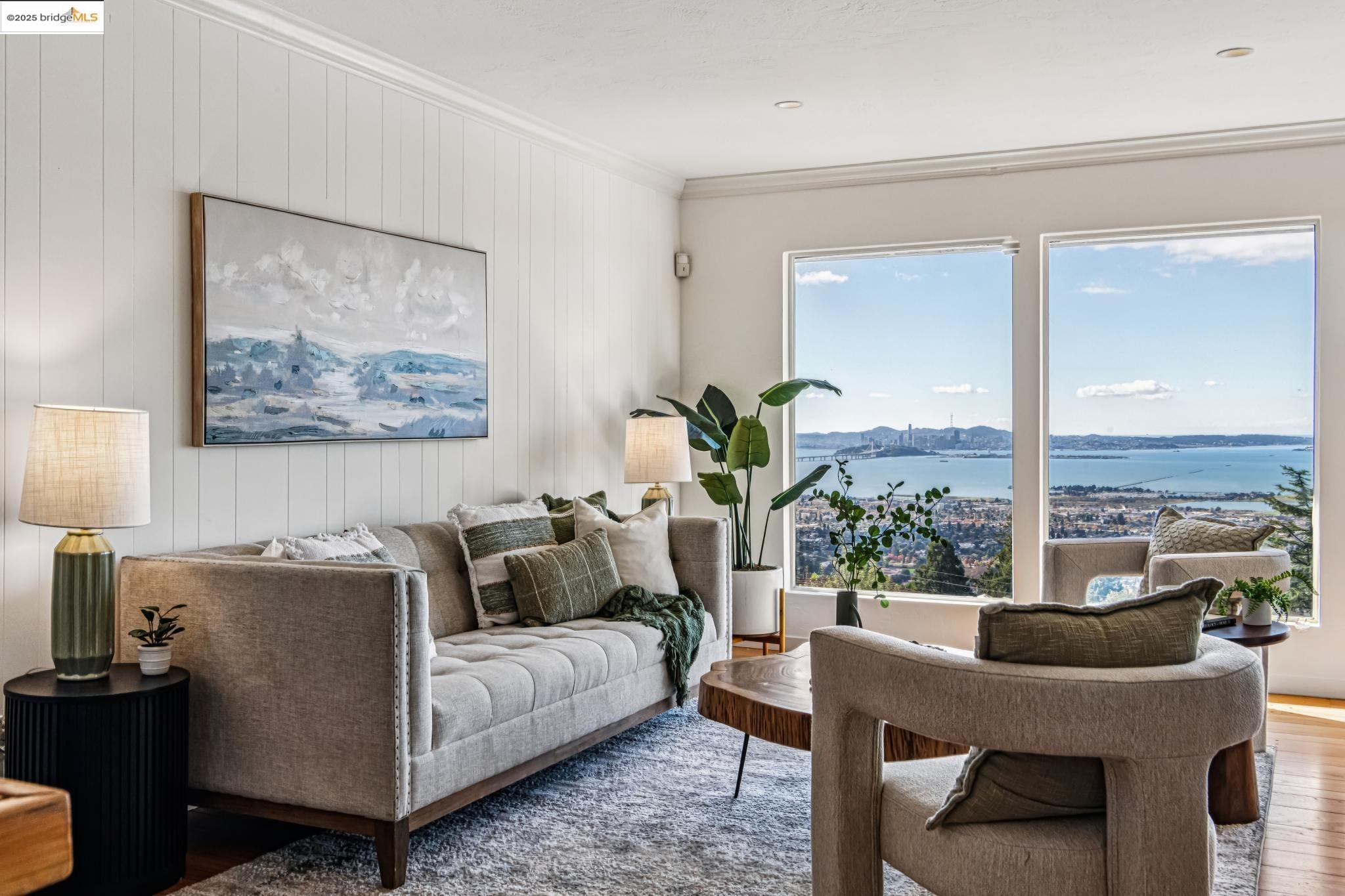 946 Creston Road Berkeley, CA 94708 - Photo 2 of 44 a living room with furniture and a large window