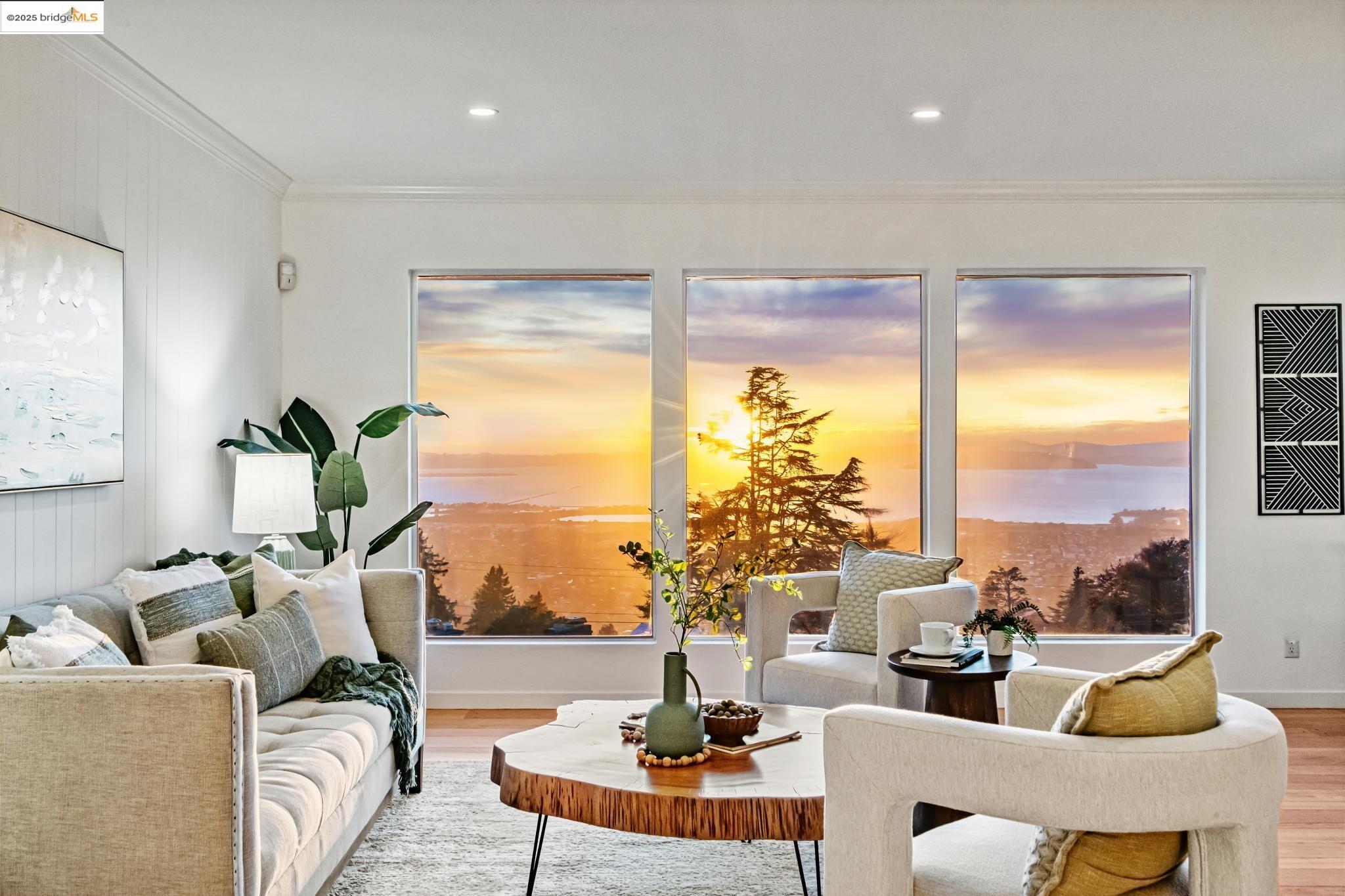 946 Creston Road Berkeley, CA 94708 - Photo 24 of 44 a living room with furniture and a large window