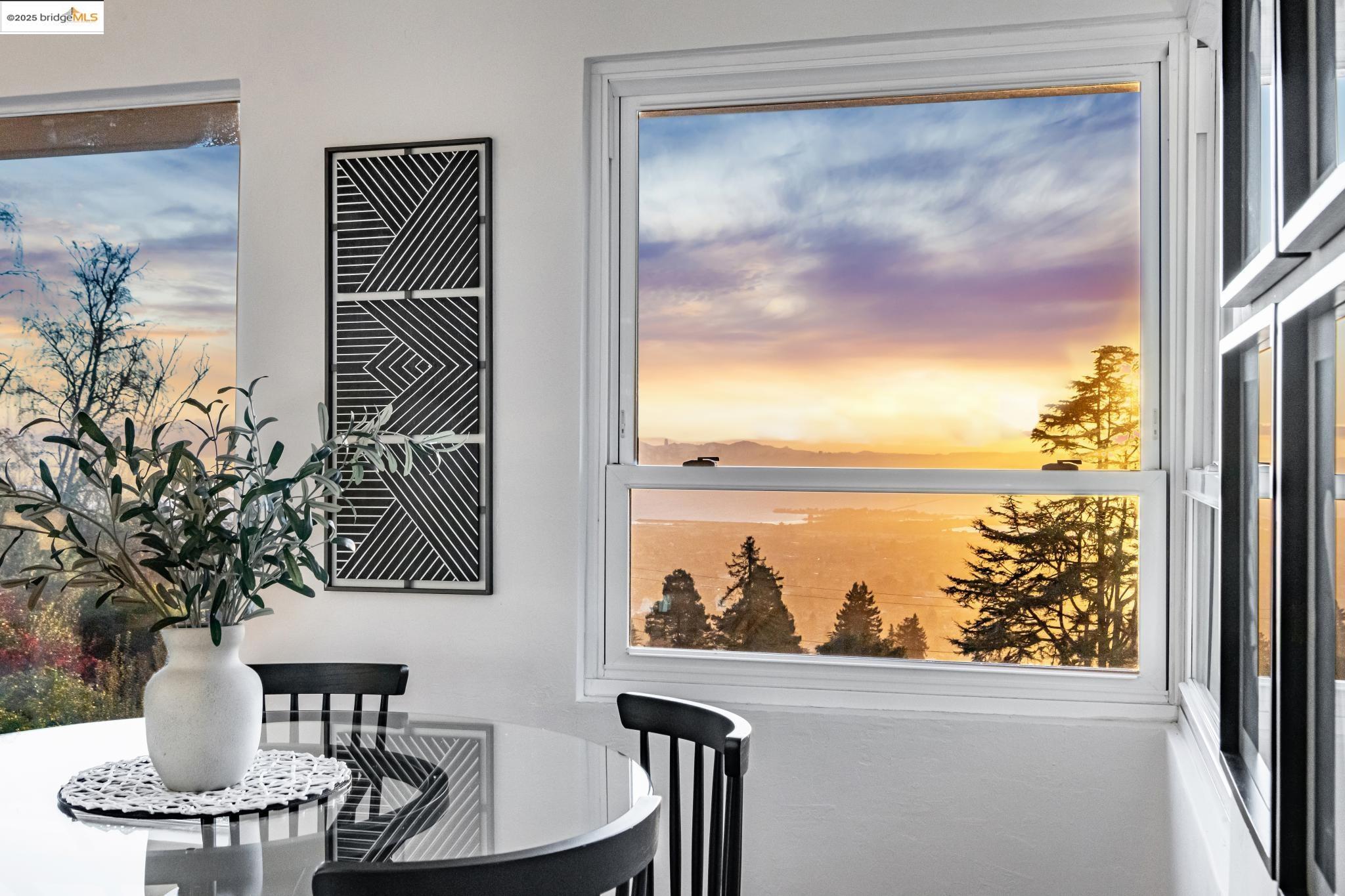 946 Creston Road Berkeley, CA 94708 - Photo 25 of 44 a vase of flowers sitting on a table with kitchen view