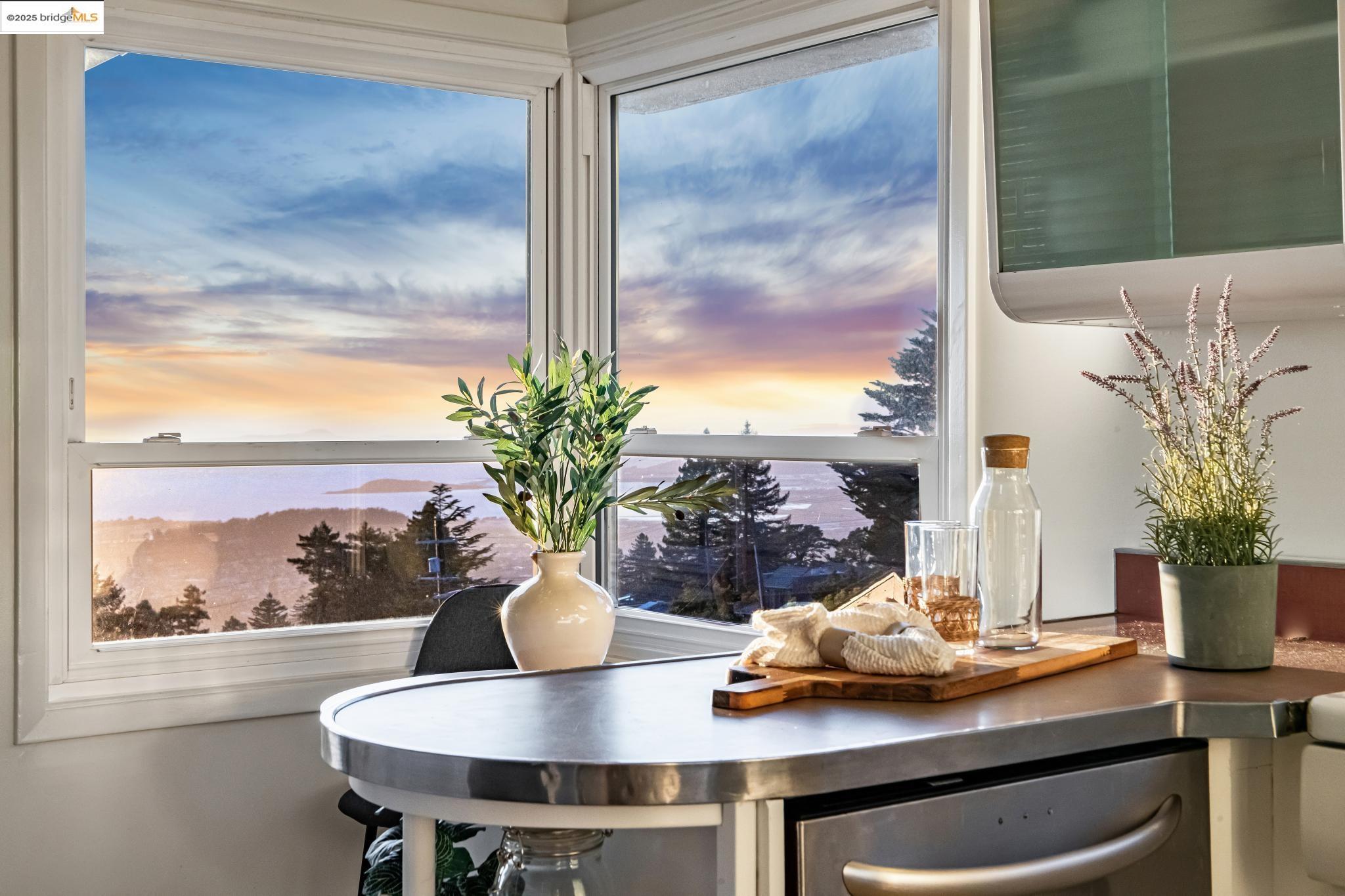 946 Creston Road Berkeley, CA 94708 - Photo 26 of 44 a view of a dining room with furniture window and outside view