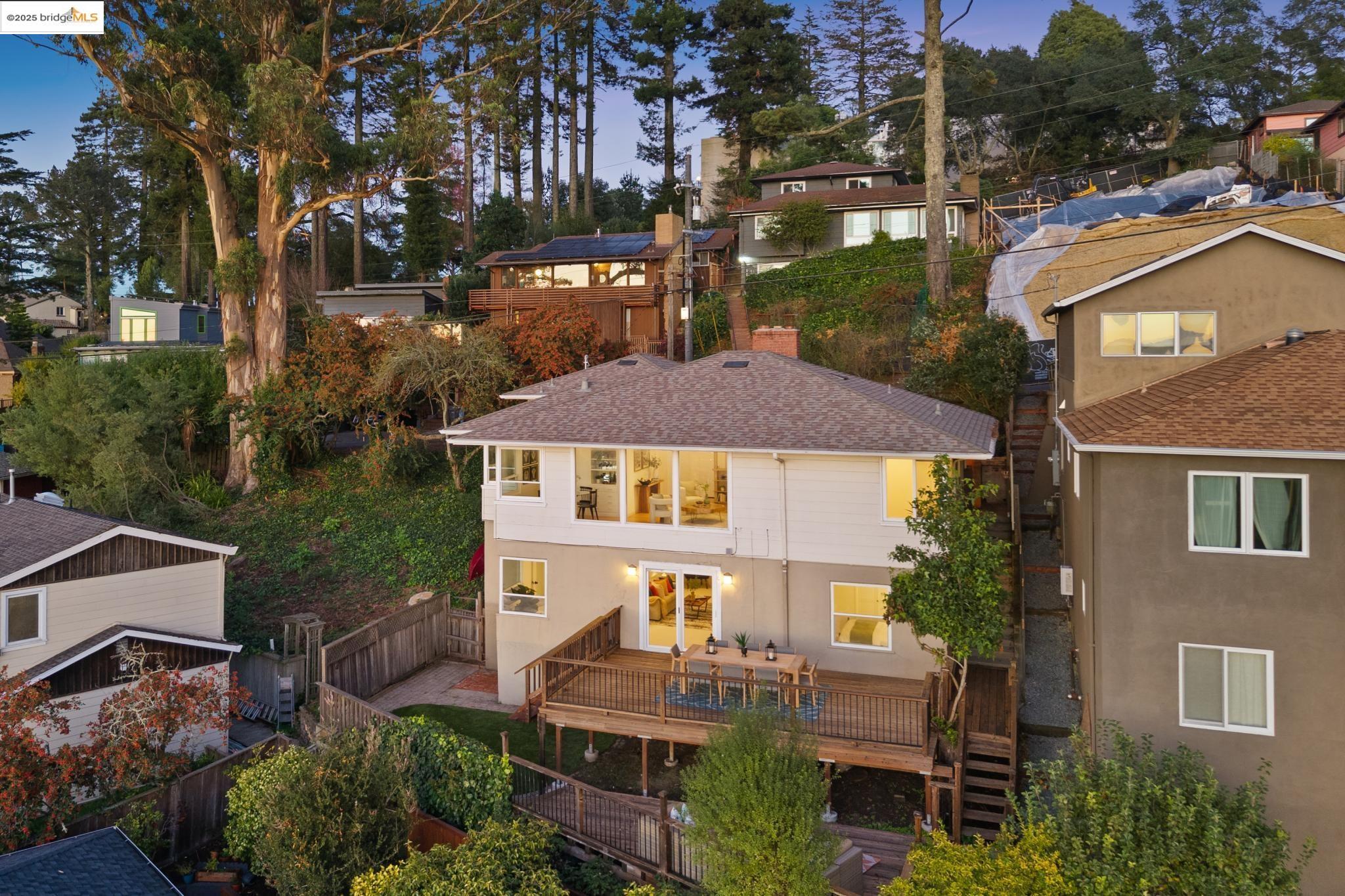 946 Creston Road Berkeley, CA 94708 - Photo 34 of 44 an aerial view of multiple houses with a yard