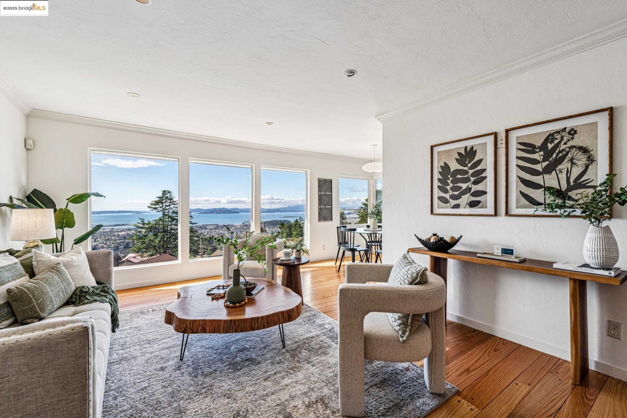 946 Creston Road Berkeley, CA 94708 - Photo 5 of 44 a living room with furniture and a potted plant