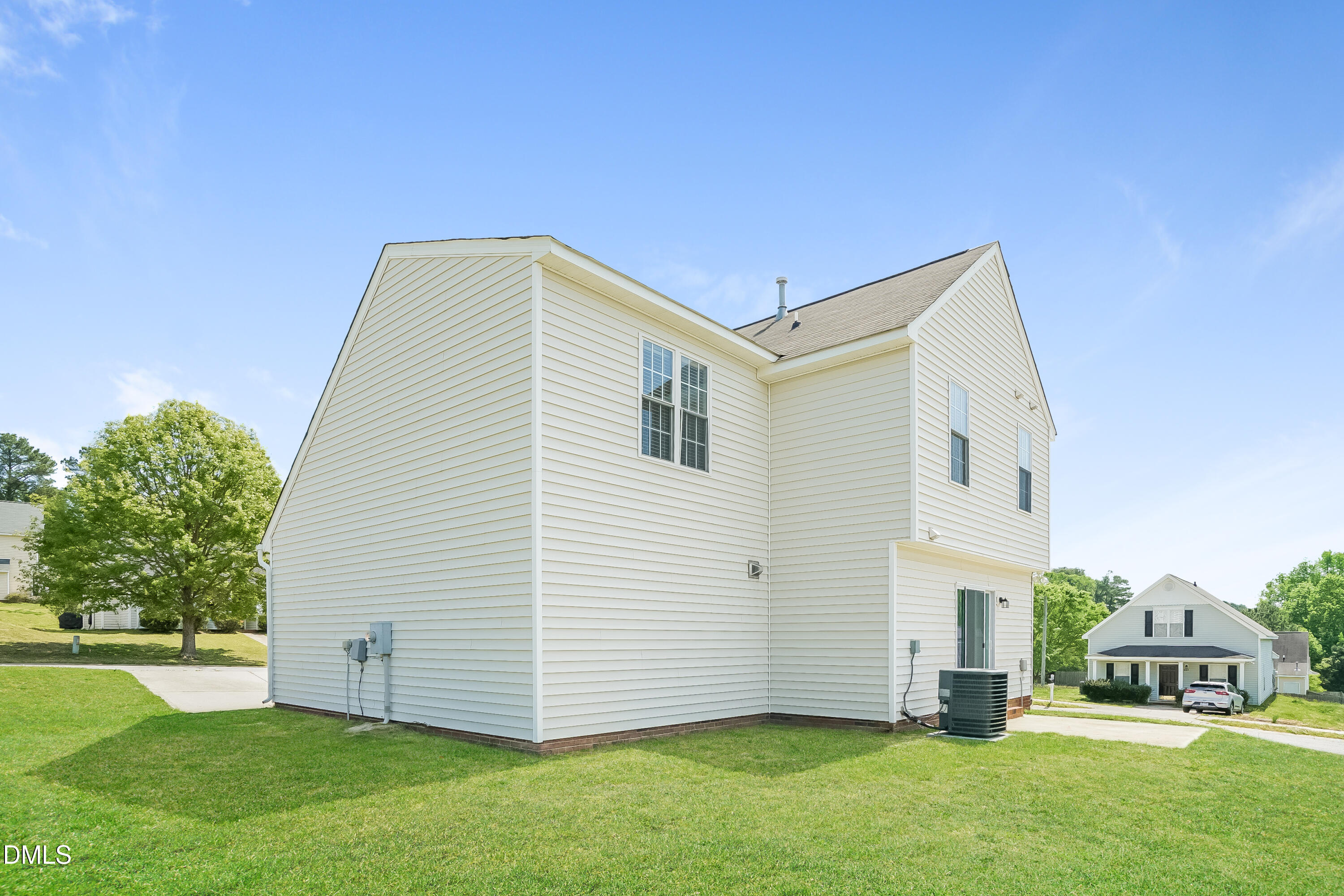 5436 Advantis Drive Raleigh, NC 27610 - Photo 15 of 15 a view of a house with a yard