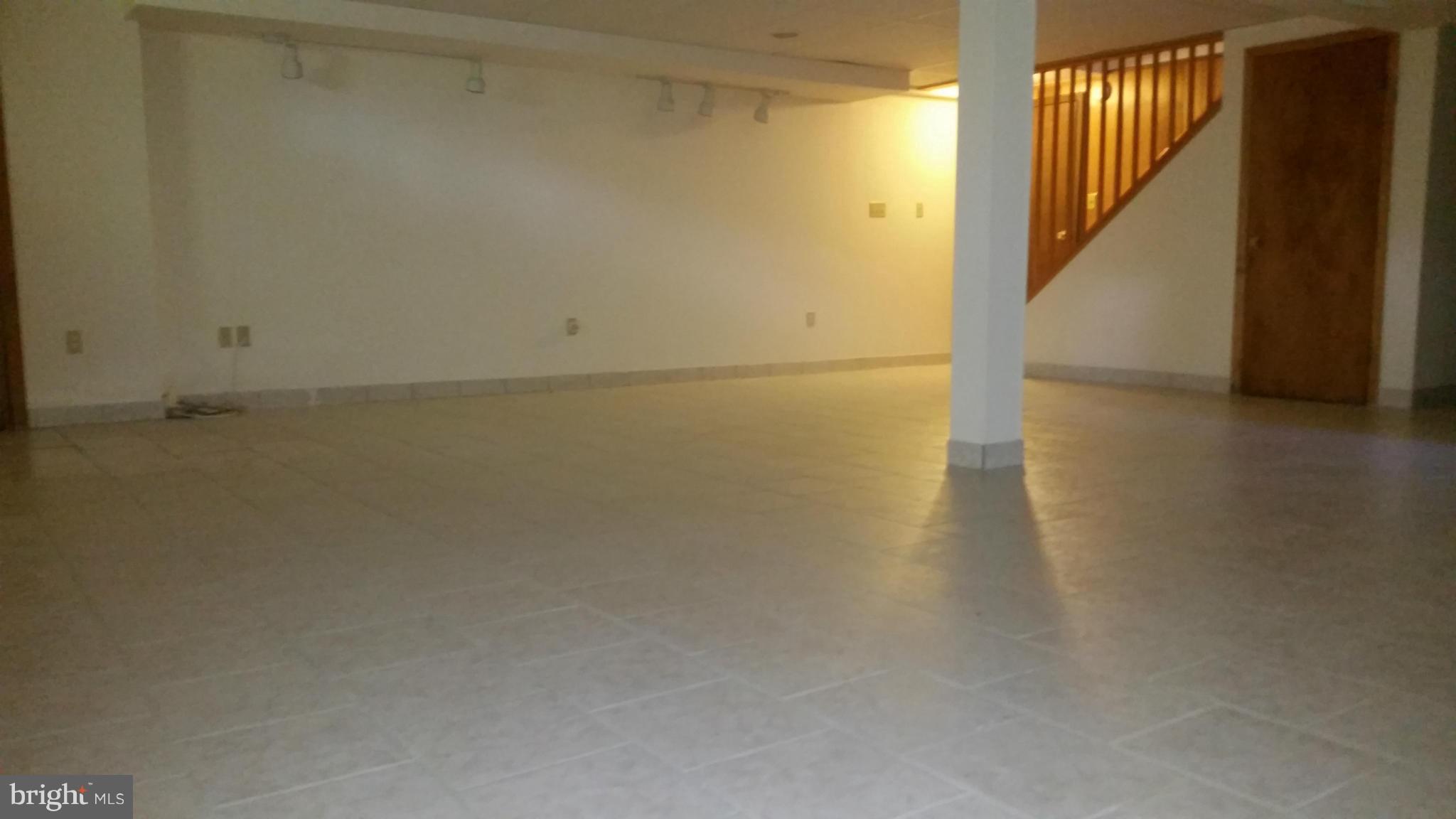 2119 Pot Spring Road Lutherville-Timonium, MD 21093 - Photo 24 of 30 a view of a room with wooden floor