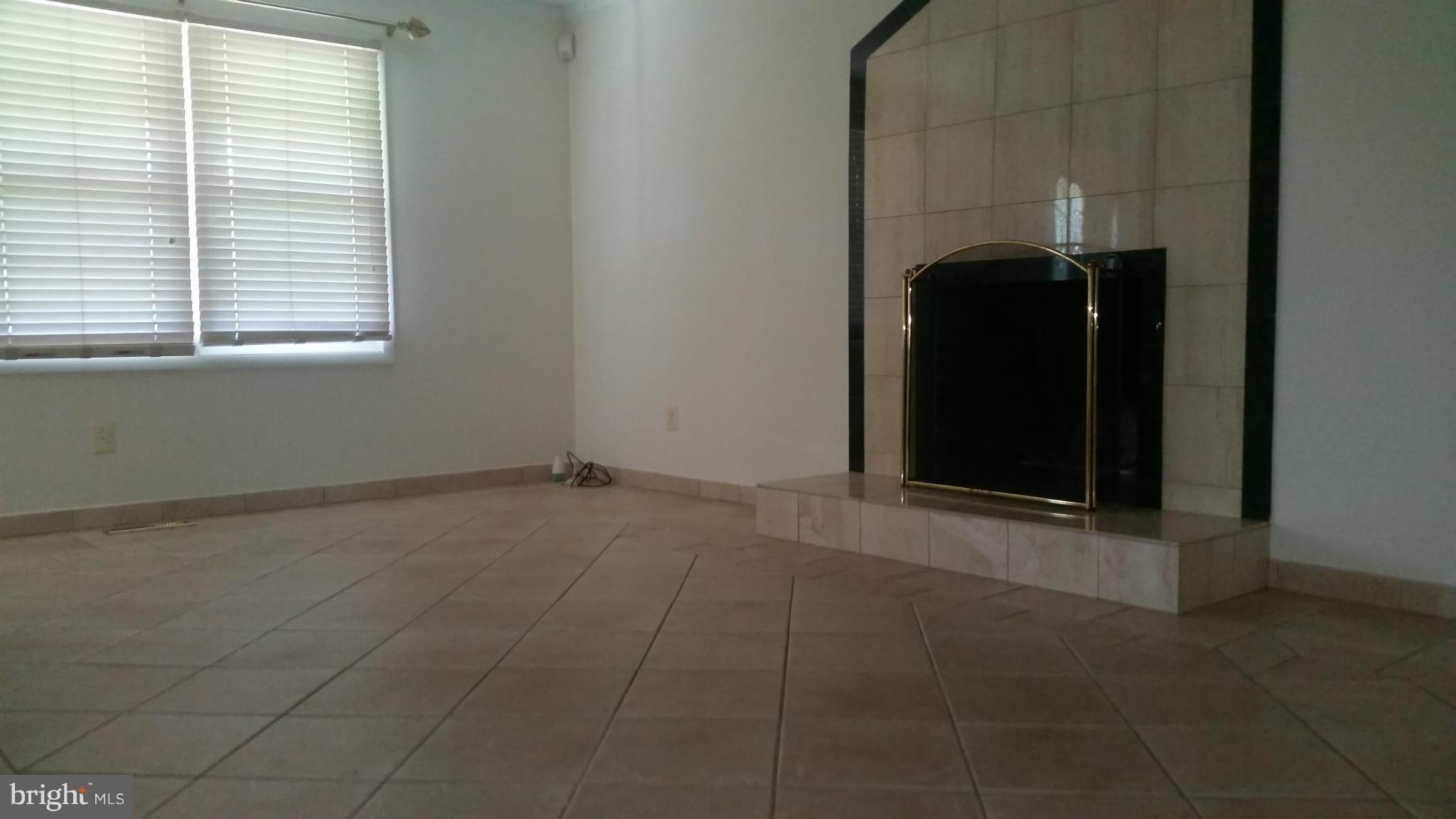 2119 Pot Spring Road Lutherville-Timonium, MD 21093 - Photo 9 of 30 a view of an empty room with a window