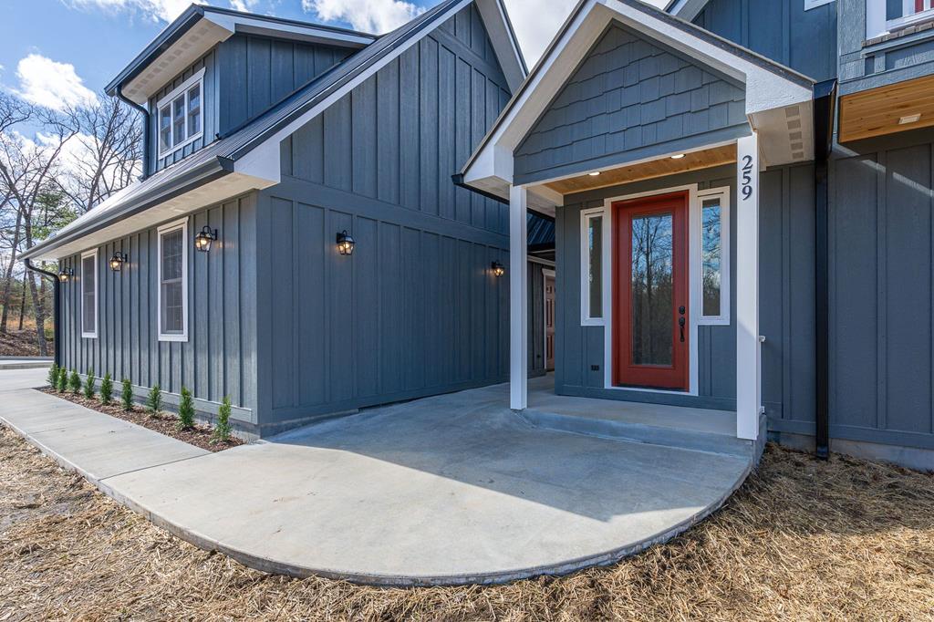 259 River Mountain Road Murphy, NC 28906 - Photo 11 of 42 a view of a house with a wooden deck
