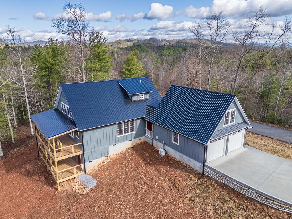 259 River Mountain Road Murphy, NC 28906 - Photo 33 of 42 a aerial view of a house with table and chairs