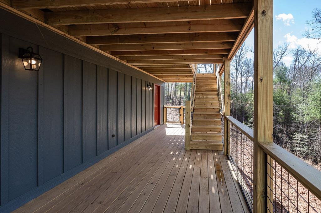 259 River Mountain Road Murphy, NC 28906 - Photo 37 of 42 a view of a balcony with wooden floor