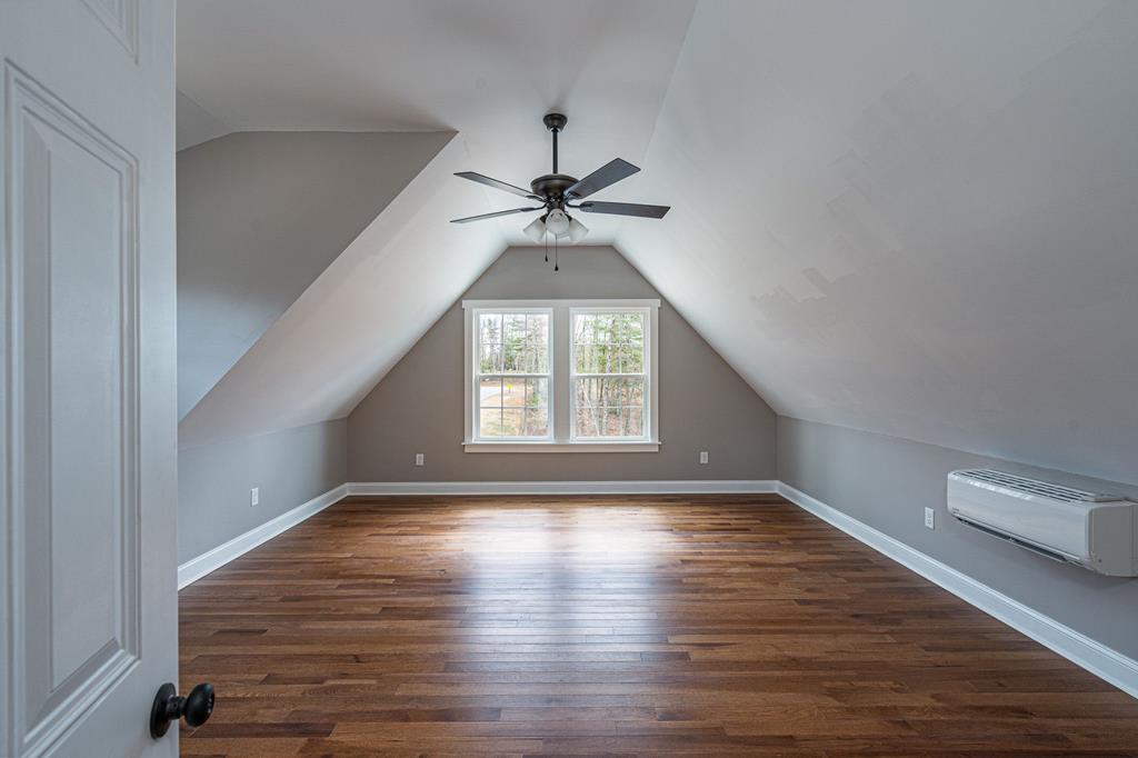259 River Mountain Road Murphy, NC 28906 - Photo 8 of 42 wooden floor in an empty room with a window