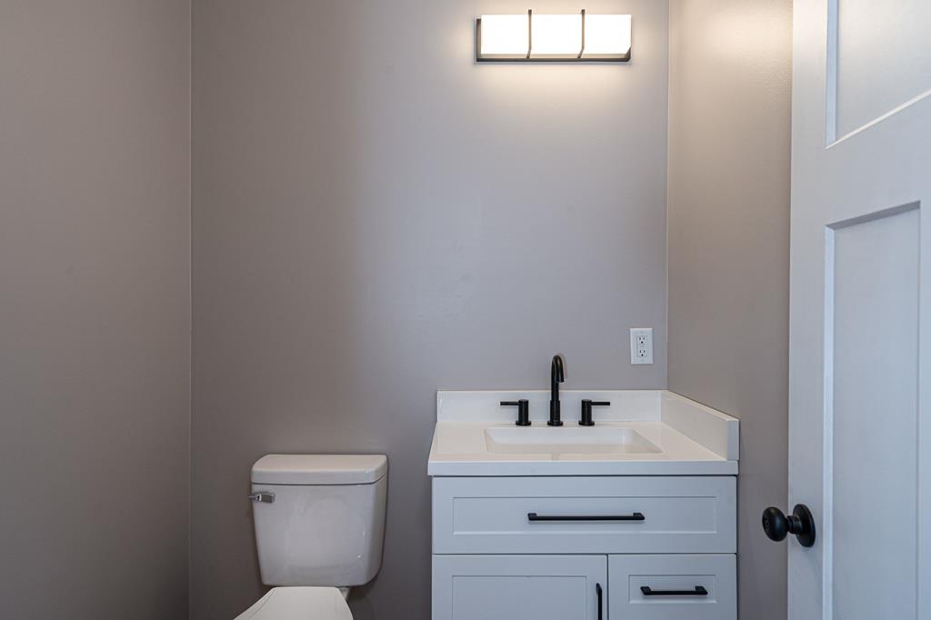 259 River Mountain Road Murphy, NC 28906 - Photo 10 of 42 a bathroom with a sink mirror and toilet