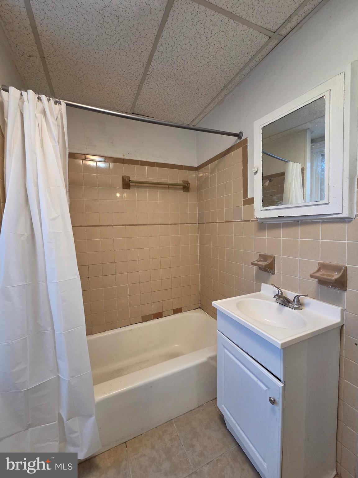 1024 North 11th Street Reading, PA 19604 - Photo 15 of 23 a bathroom with a sink and a mirror