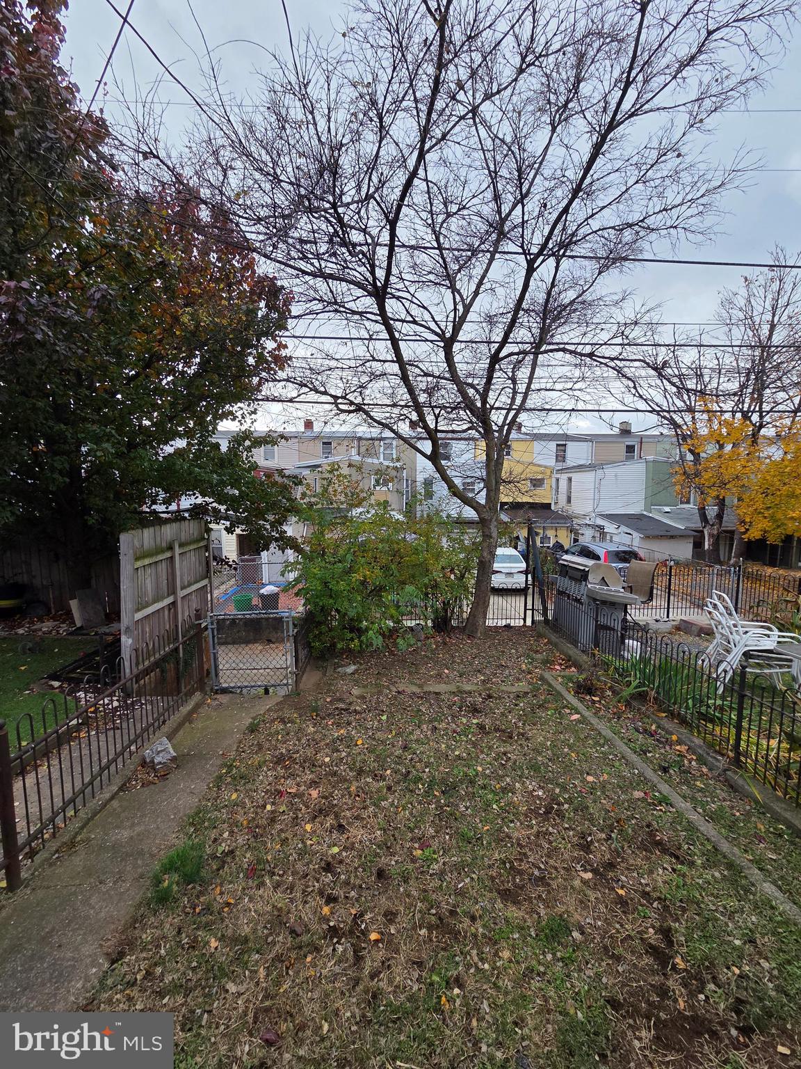 1024 North 11th Street Reading, PA 19604 - Photo 21 of 23 a backyard of a house with table and chairs