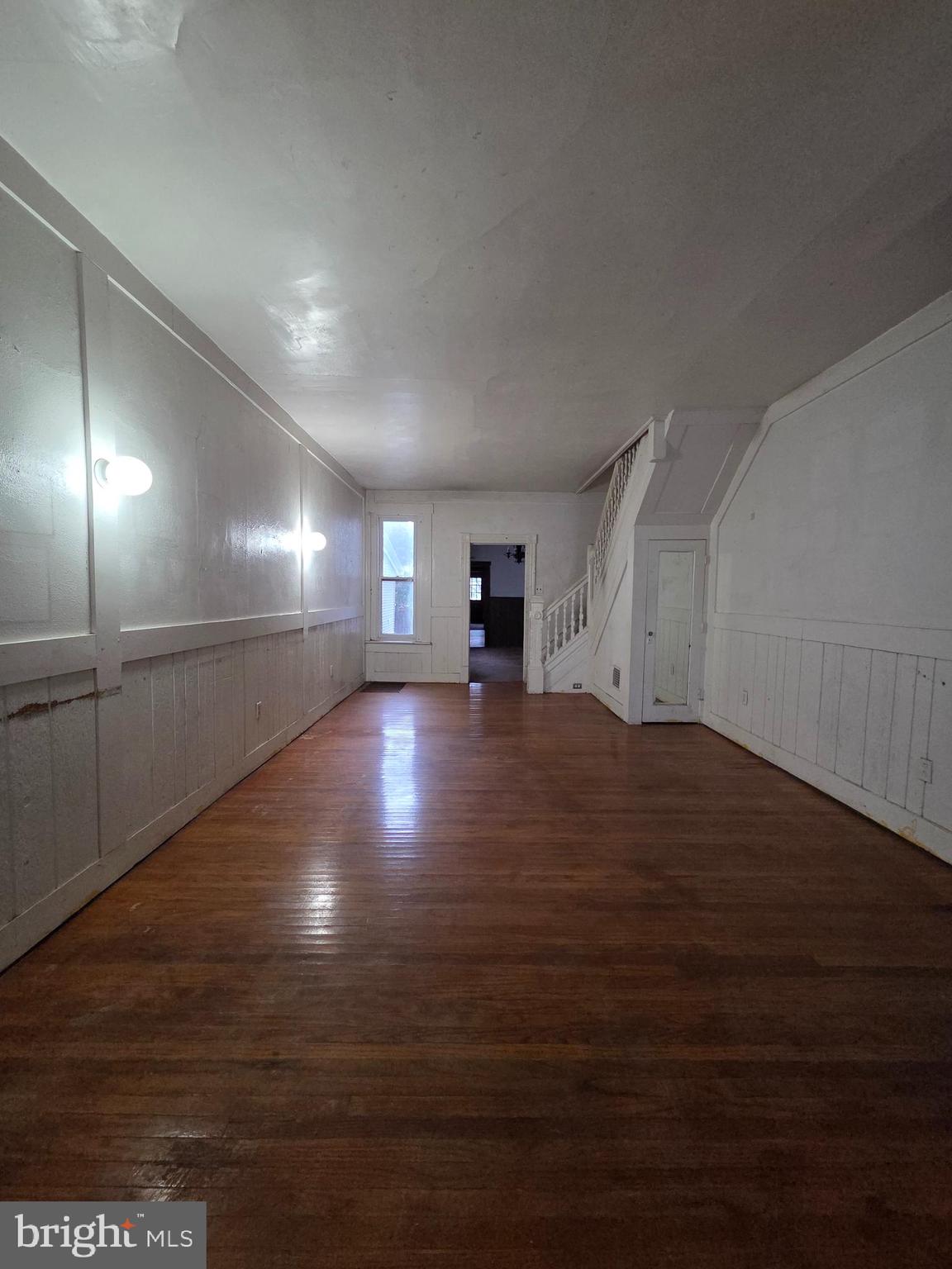 1024 North 11th Street Reading, PA 19604 - Photo 6 of 23 a view of empty room with wooden floor