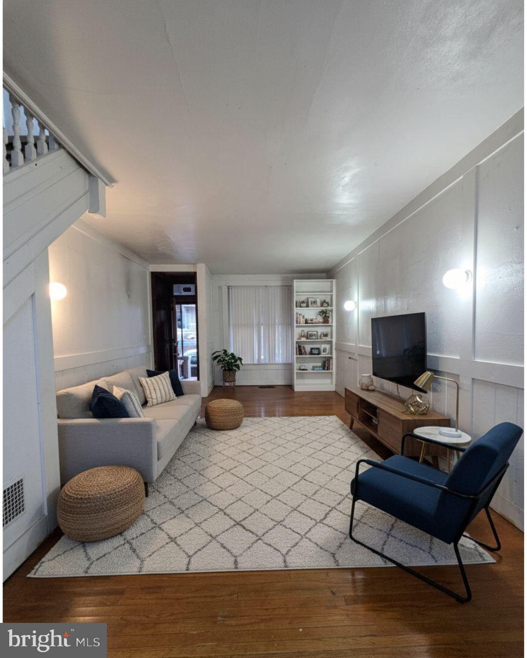1024 North 11th Street Reading, PA 19604 - Photo 7 of 23 a living room with furniture and a flat screen tv