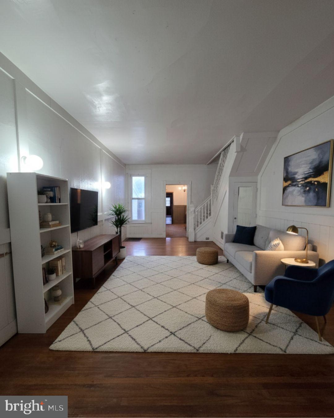 1024 North 11th Street Reading, PA 19604 - Photo 8 of 23 a living room with furniture and a flat screen tv