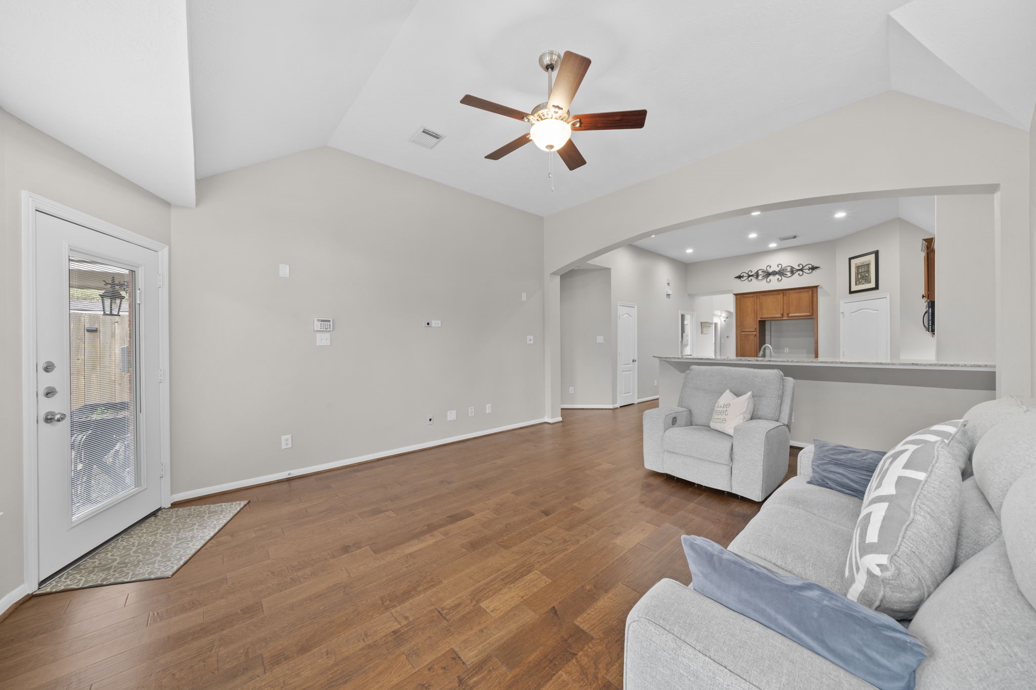 226 Whispering Ridge Terrace Houston, TX 77094 - Photo 11 of 31 a living room with furniture and a ceiling fan