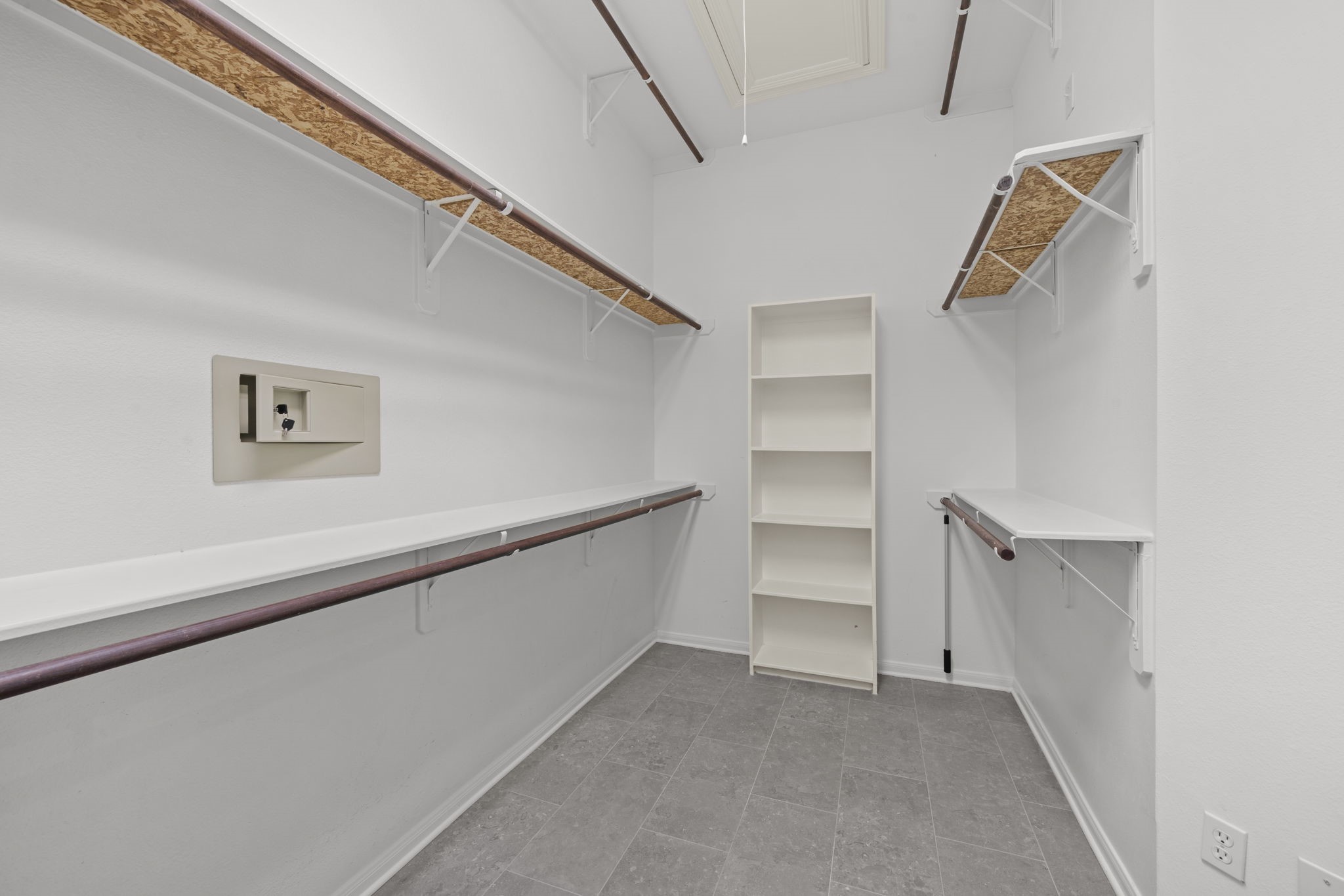 226 Whispering Ridge Terrace Houston, TX 77094 - Photo 16 of 31 a view of an empty walk in closet