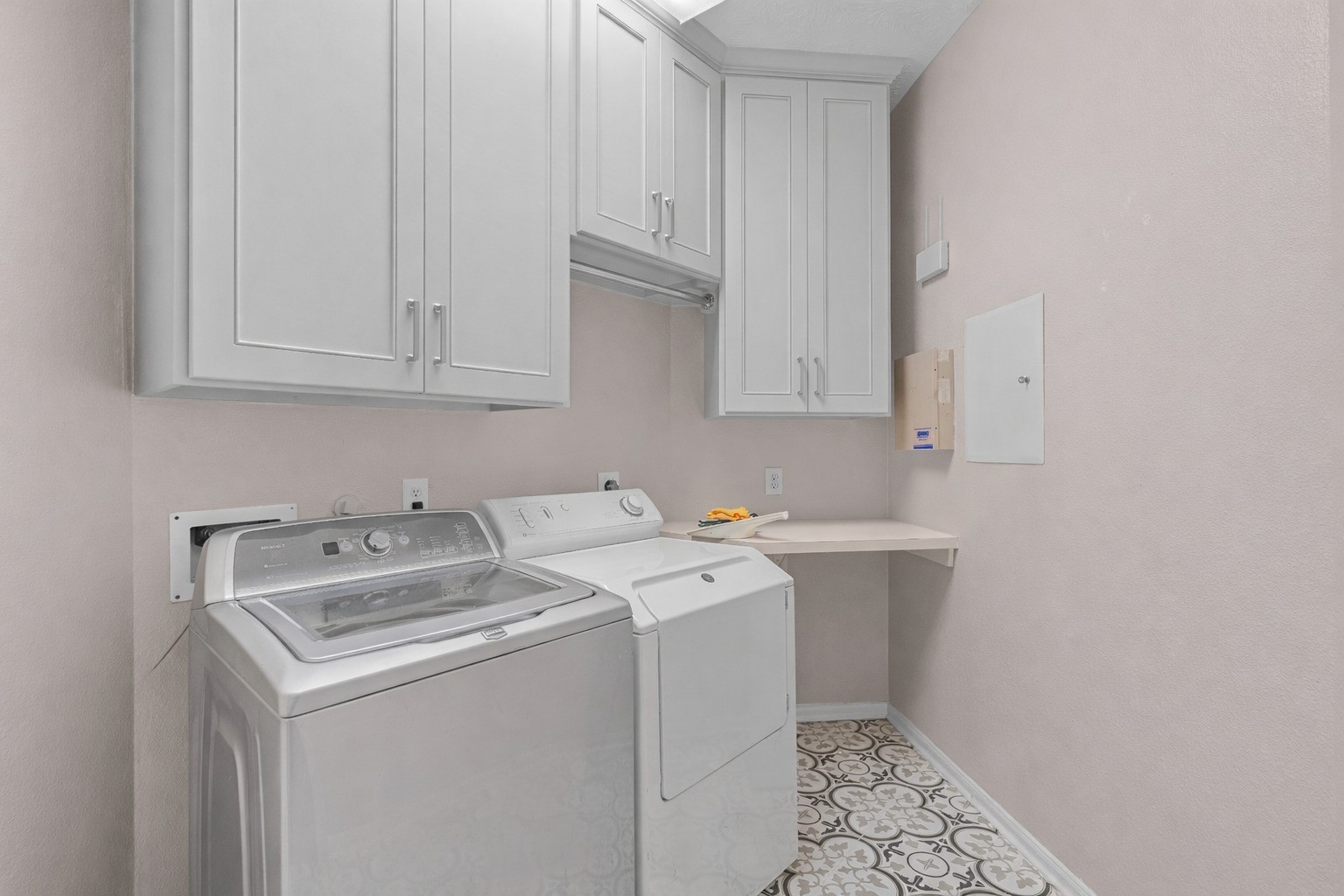 226 Whispering Ridge Terrace Houston, TX 77094 - Photo 20 of 31 a utility room with dryer and washer