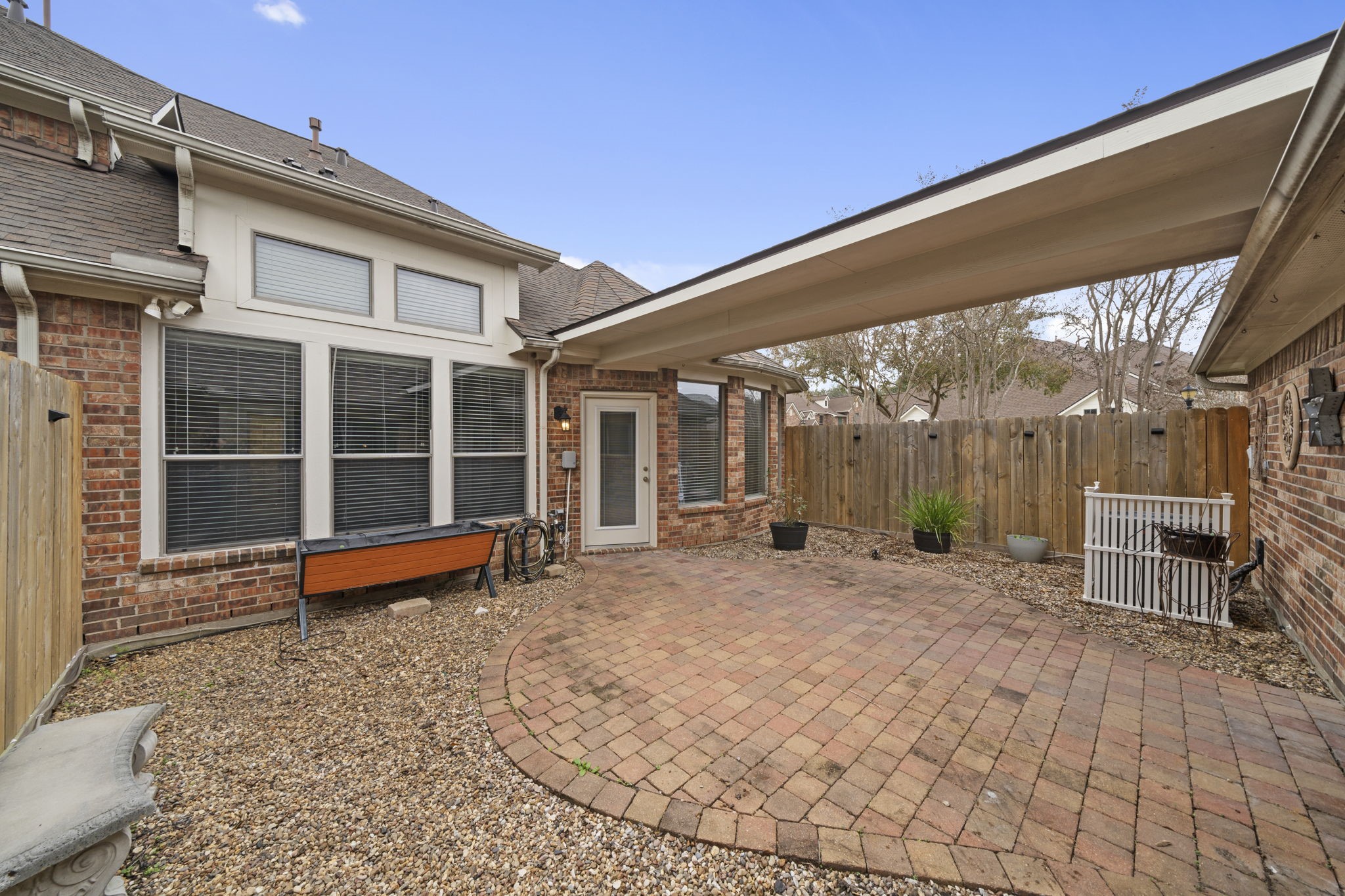 226 Whispering Ridge Terrace Houston, TX 77094 - Photo 21 of 31 a view of a outdoor space with porch and wooden floor