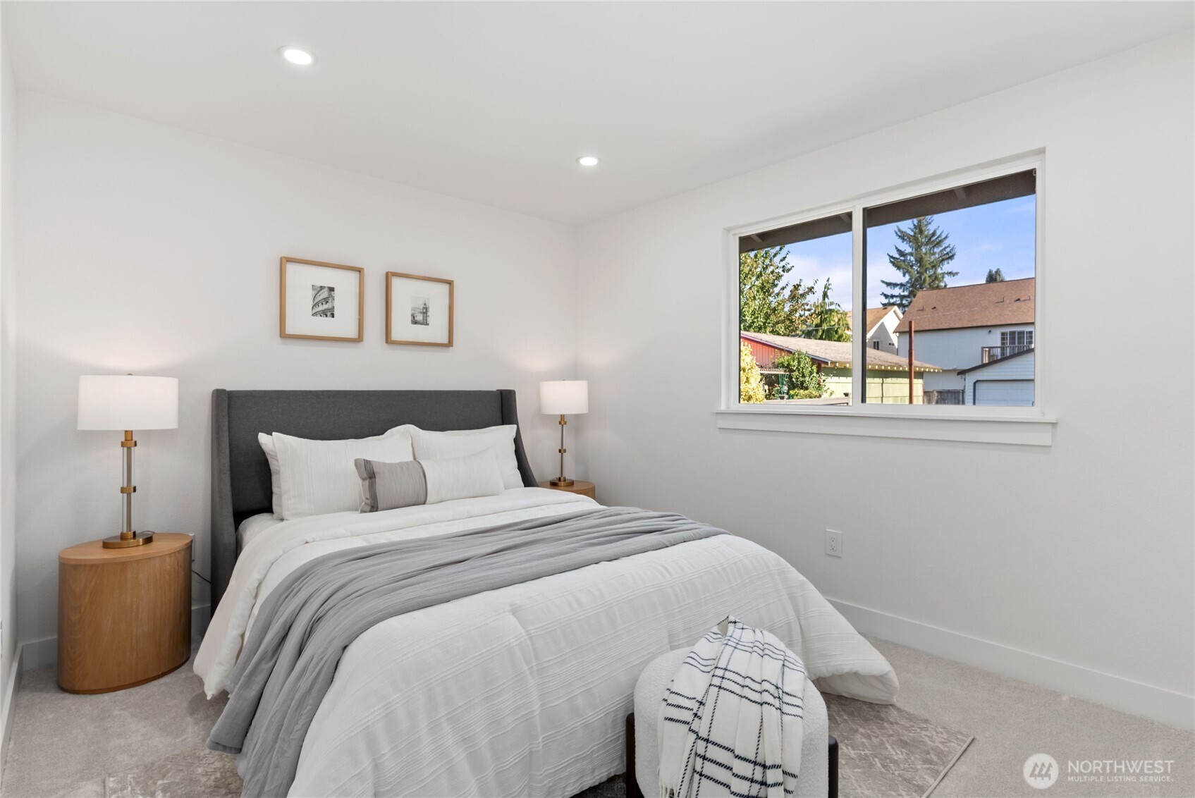 9548 3rd Avenue Northwest Seattle, WA 98117 - Photo 20 of 40 a bedroom with a bed and a window