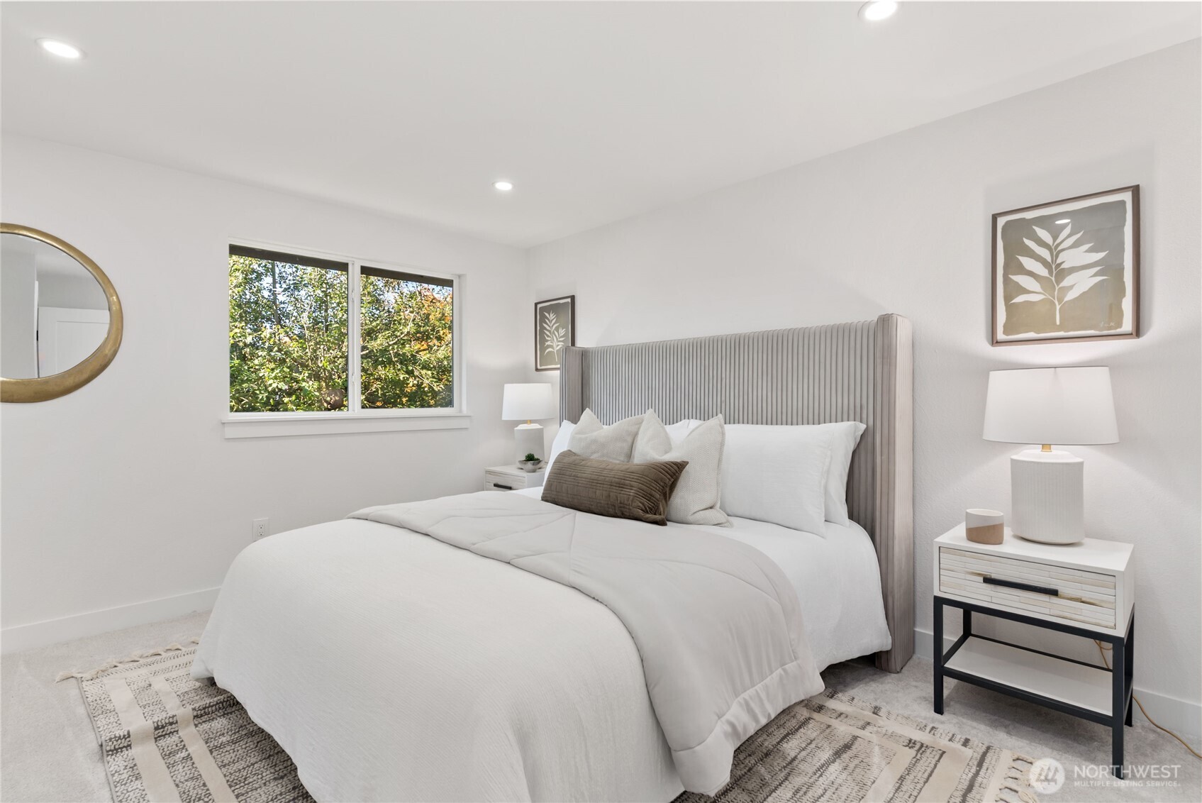 9548 3rd Avenue Northwest Seattle, WA 98117 - Photo 21 of 40 a bedroom with a bed and a window