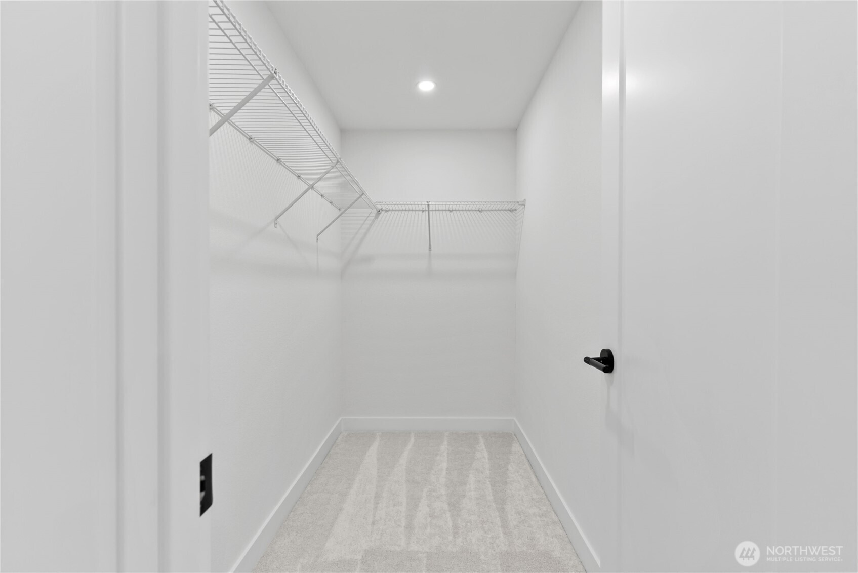 9548 3rd Avenue Northwest Seattle, WA 98117 - Photo 23 of 40 a view of room with walk in closet and window