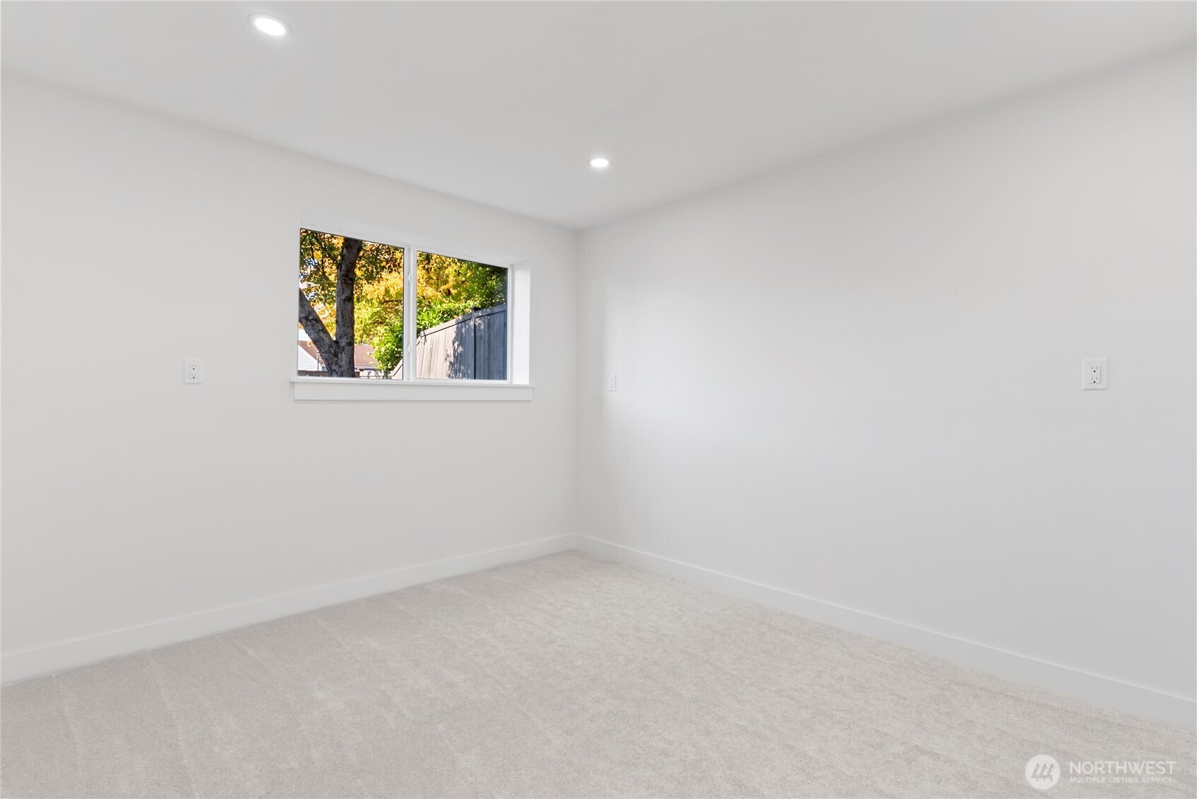9548 3rd Avenue Northwest Seattle, WA 98117 - Photo 27 of 40 a view of an empty room with window