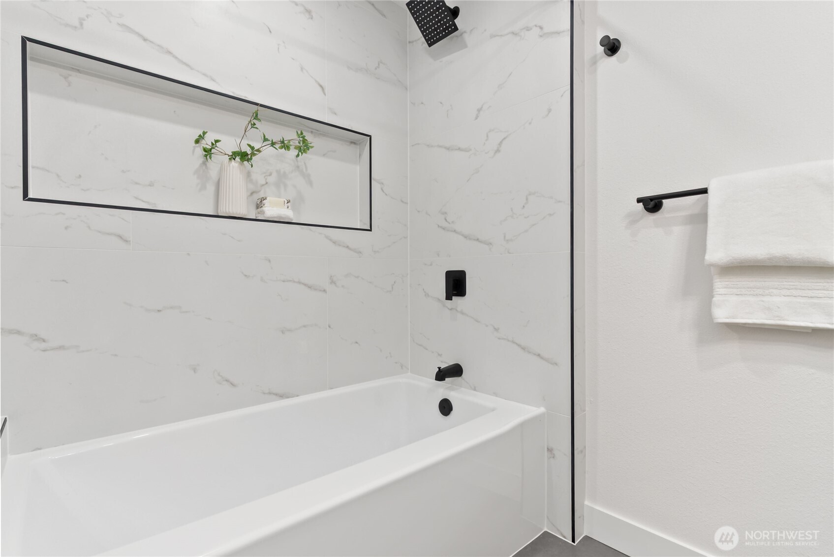 9548 3rd Avenue Northwest Seattle, WA 98117 - Photo 29 of 40 a bathroom with a bathtub and shower