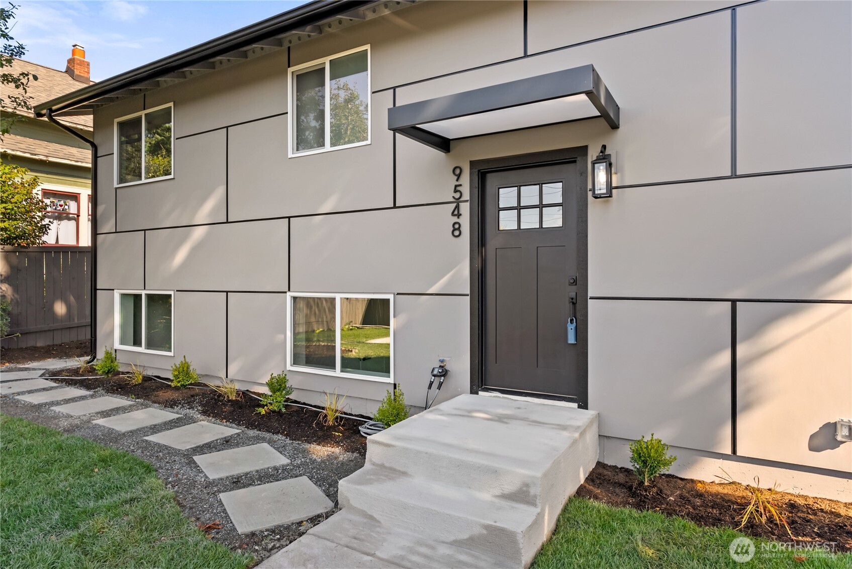 9548 3rd Avenue Northwest Seattle, WA 98117 - Photo 3 of 40 a backyard of a house