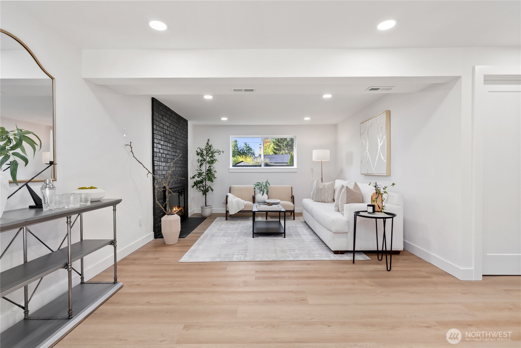 9548 3rd Avenue Northwest Seattle, WA 98117 - Photo 32 of 40 a living room with furniture and a table